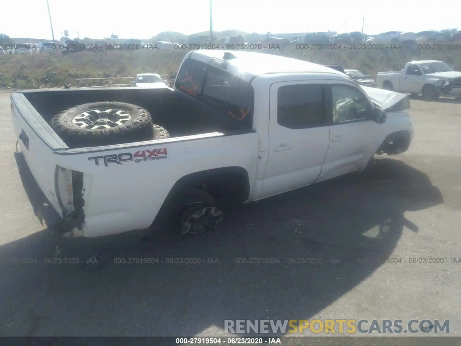 4 Photograph of a damaged car 5TFCZ5AN4KX174125 TOYOTA TACOMA 4WD 2019