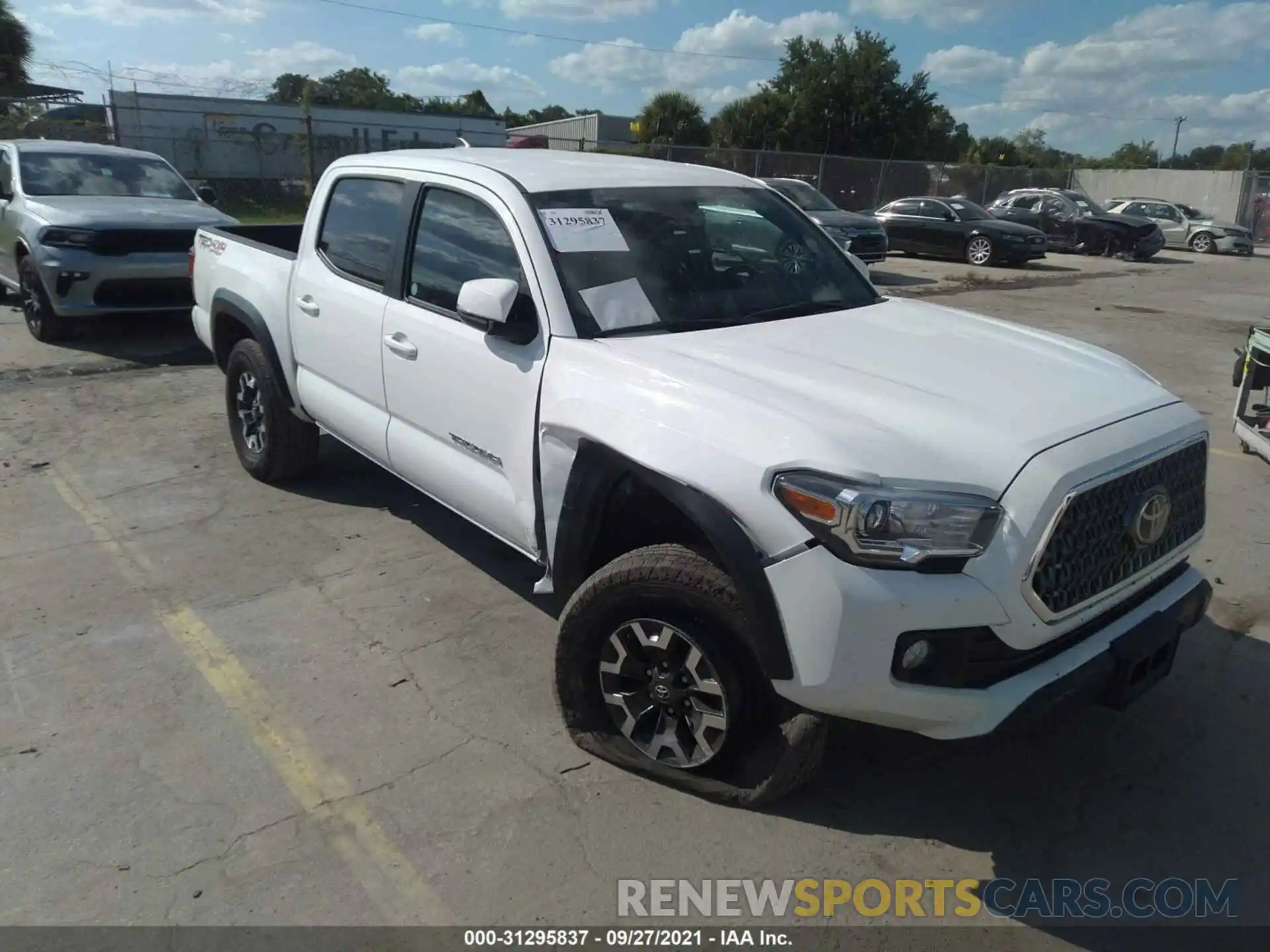 1 Photograph of a damaged car 5TFCZ5AN4KX190907 TOYOTA TACOMA 4WD 2019