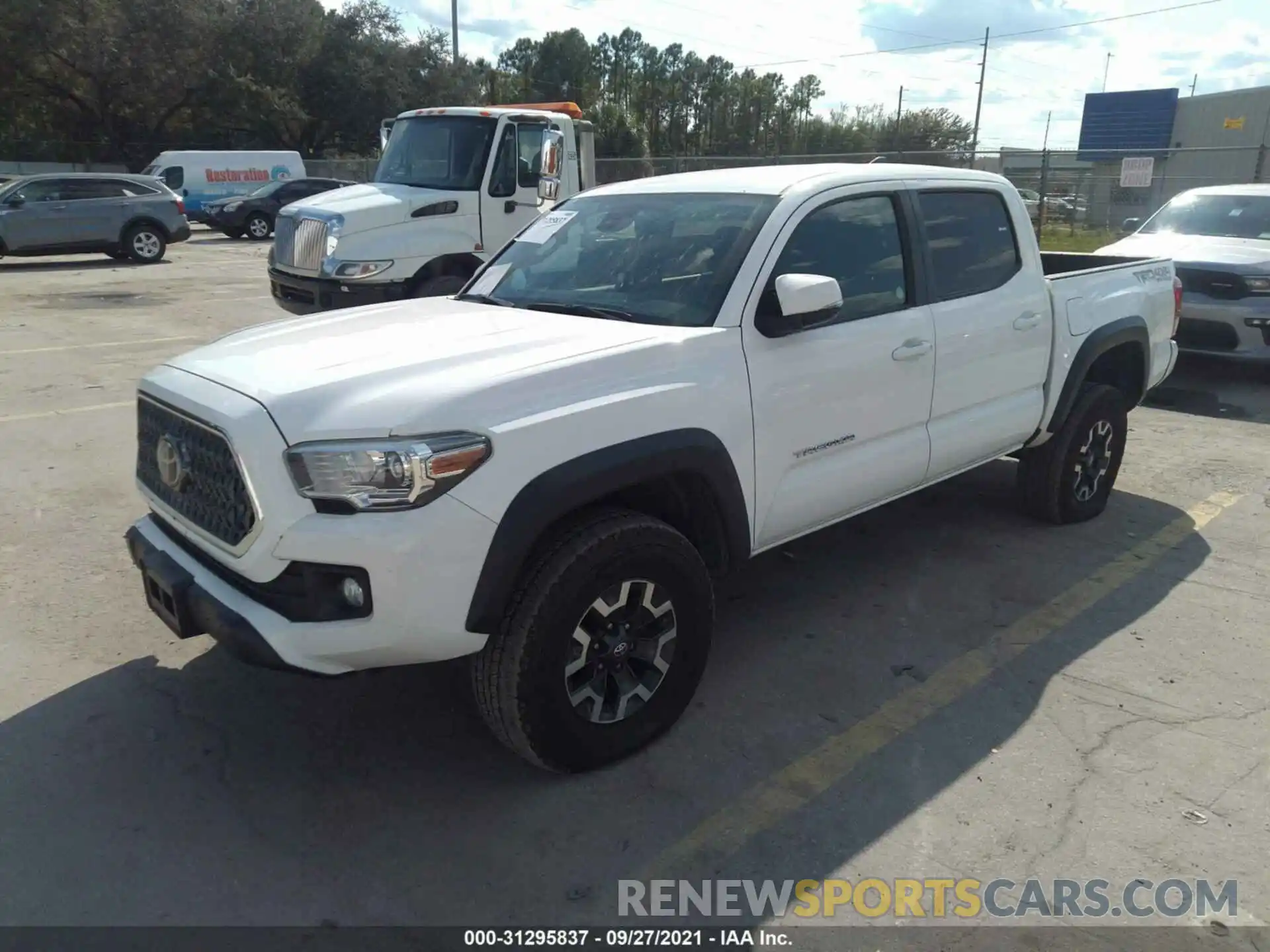 2 Photograph of a damaged car 5TFCZ5AN4KX190907 TOYOTA TACOMA 4WD 2019