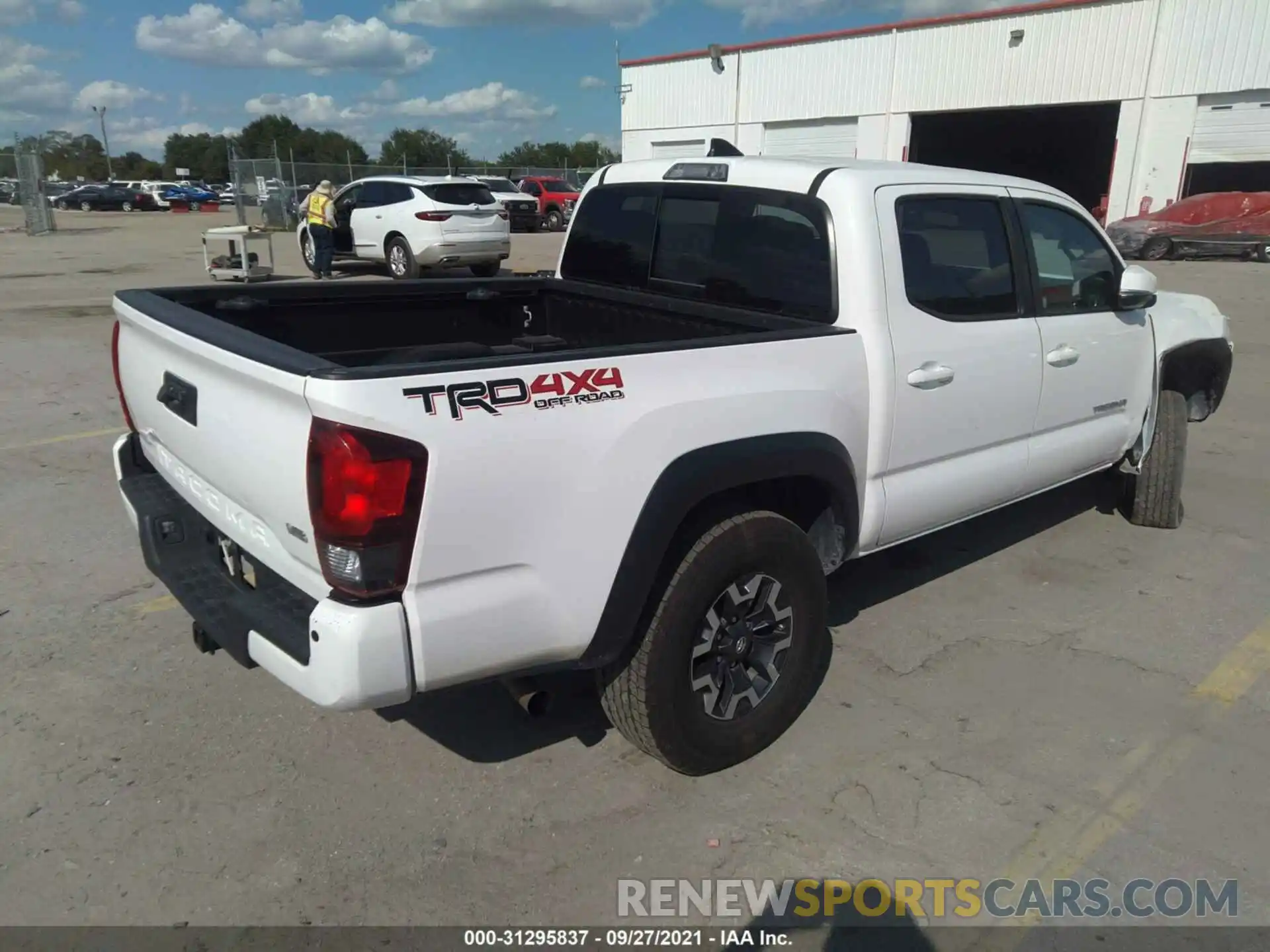 4 Photograph of a damaged car 5TFCZ5AN4KX190907 TOYOTA TACOMA 4WD 2019