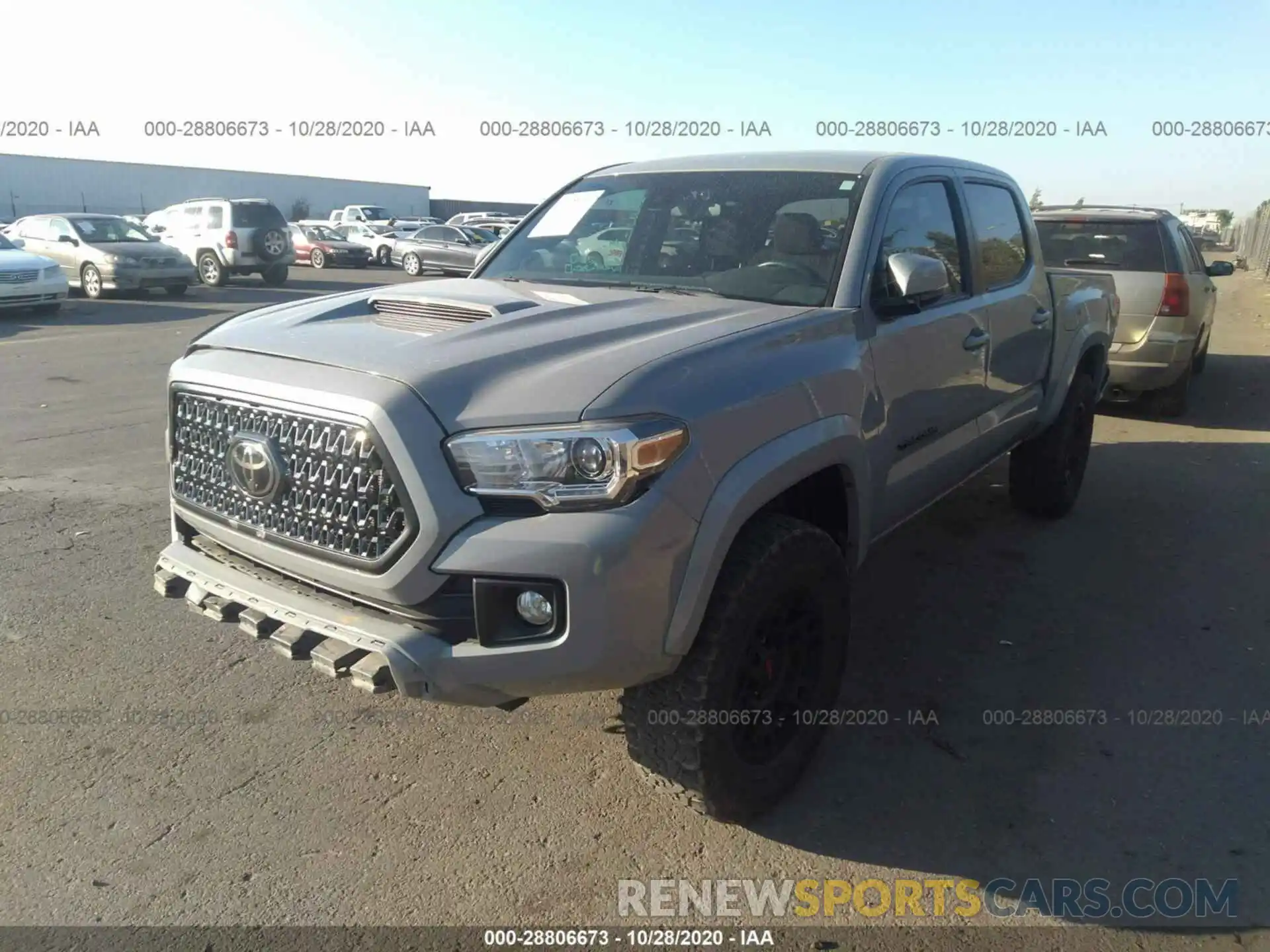 2 Photograph of a damaged car 5TFCZ5AN4KX191247 TOYOTA TACOMA 4WD 2019