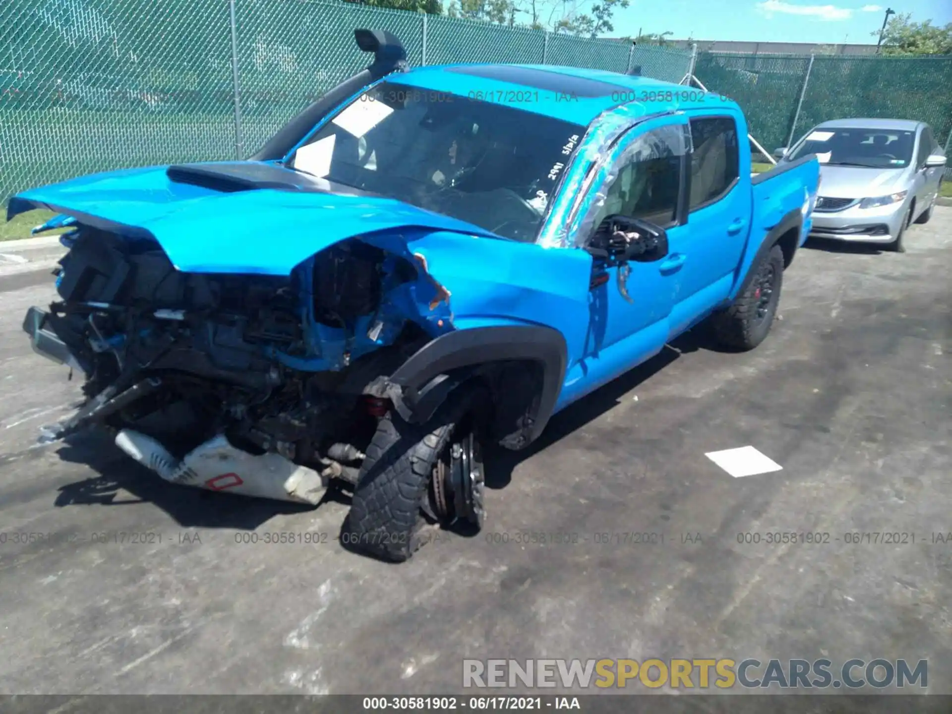 2 Photograph of a damaged car 5TFCZ5AN4KX204708 TOYOTA TACOMA 4WD 2019