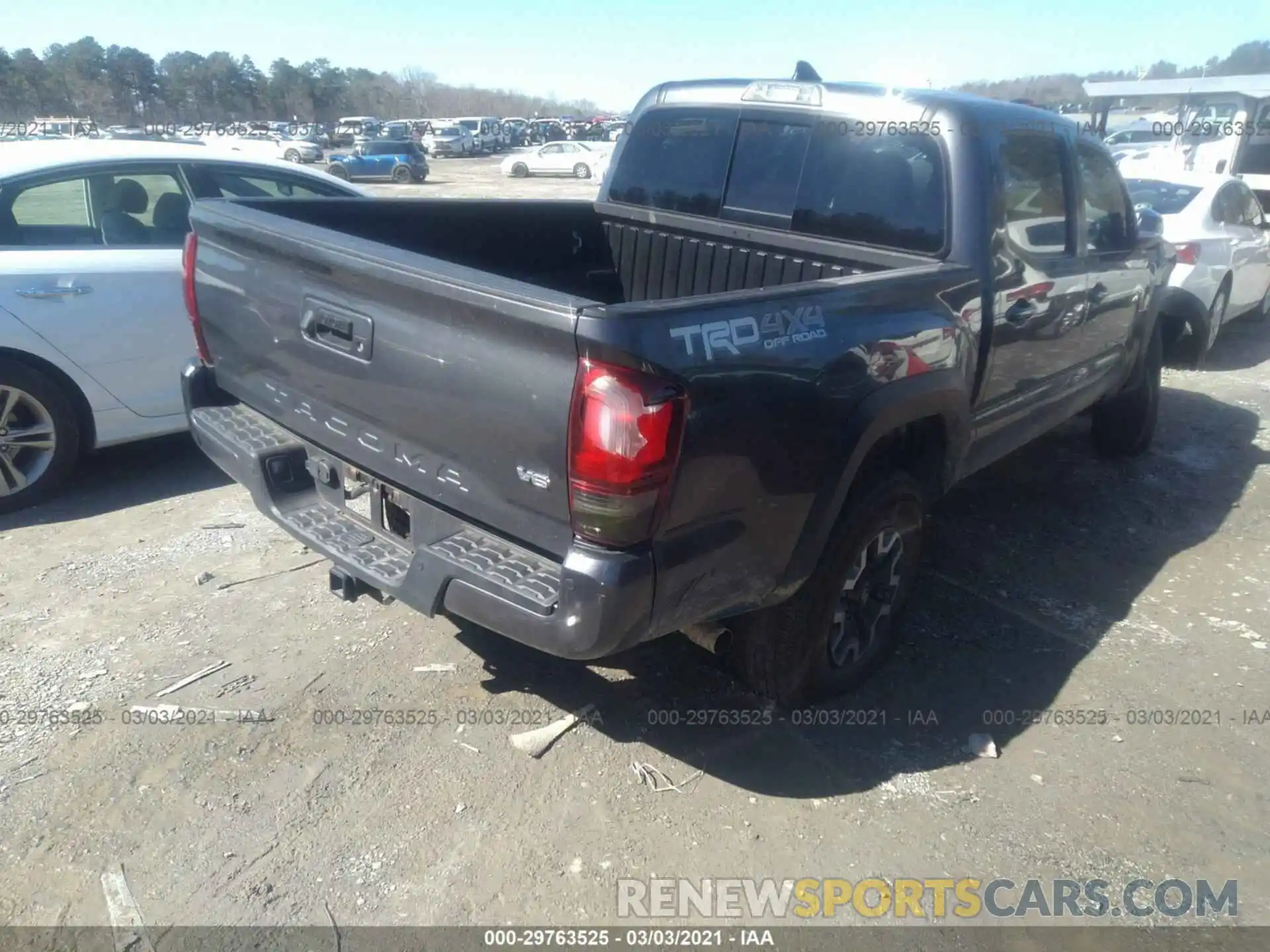 4 Photograph of a damaged car 5TFCZ5AN5KX186297 TOYOTA TACOMA 4WD 2019