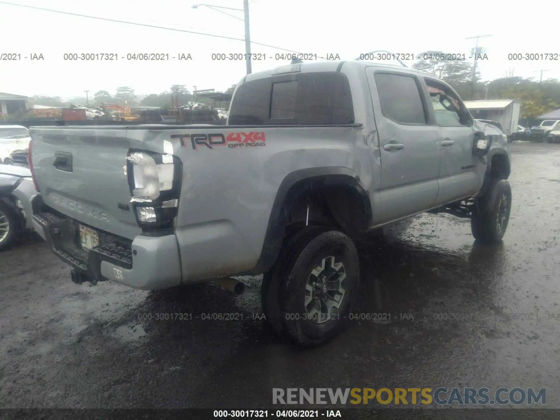 4 Photograph of a damaged car 5TFCZ5AN5KX194299 TOYOTA TACOMA 4WD 2019