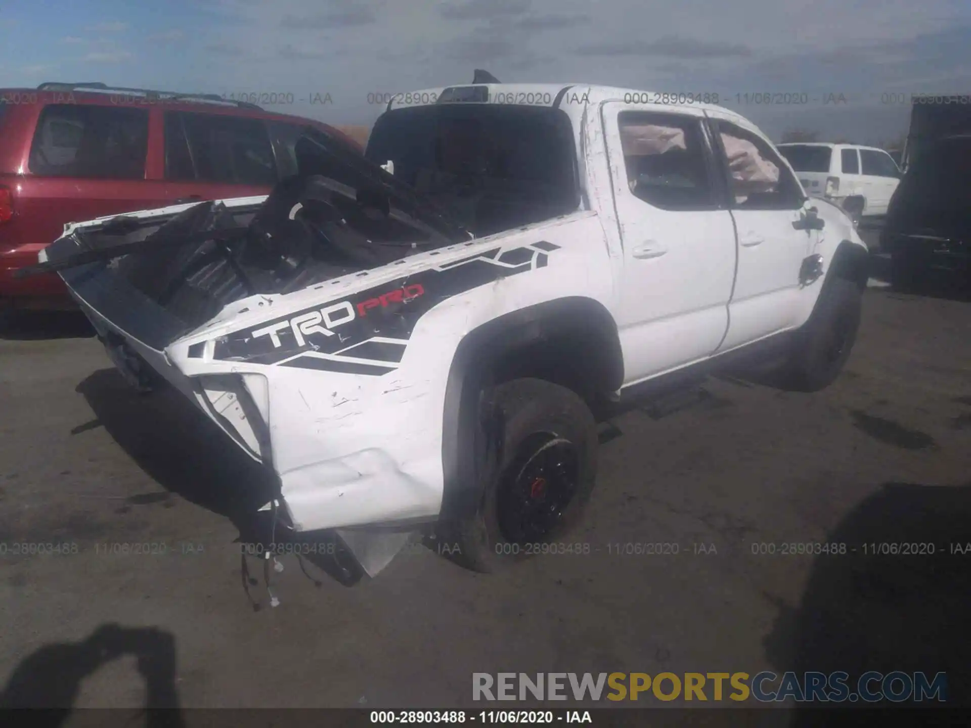 4 Photograph of a damaged car 5TFCZ5AN5KX198367 TOYOTA TACOMA 4WD 2019