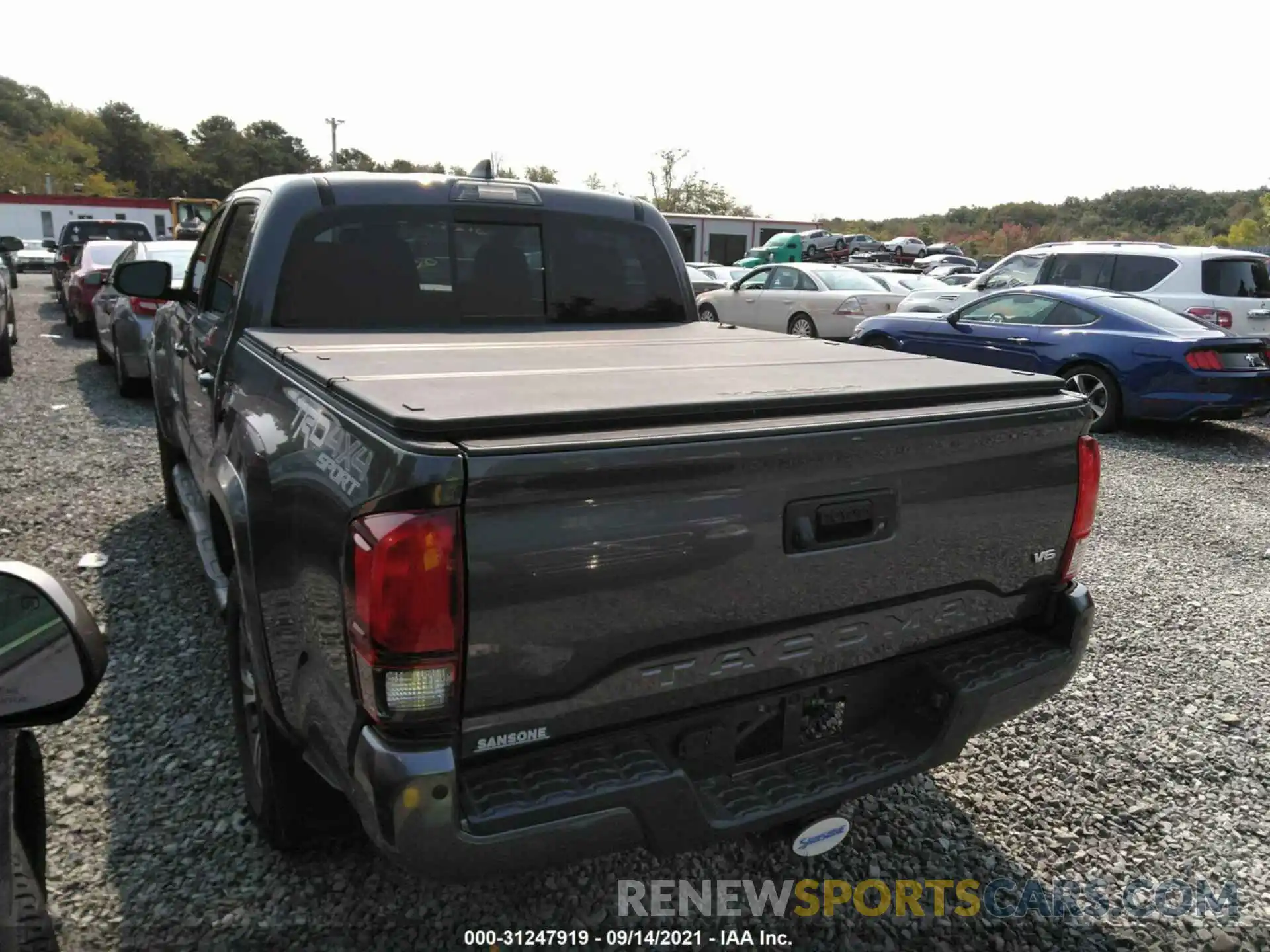 3 Photograph of a damaged car 5TFCZ5AN5KX202496 TOYOTA TACOMA 4WD 2019