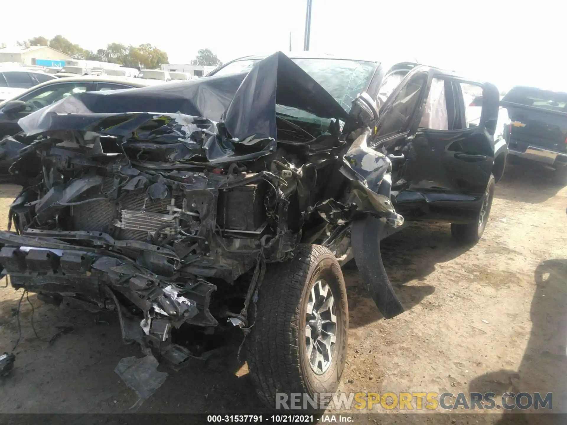 2 Photograph of a damaged car 5TFCZ5AN5KX207777 TOYOTA TACOMA 4WD 2019