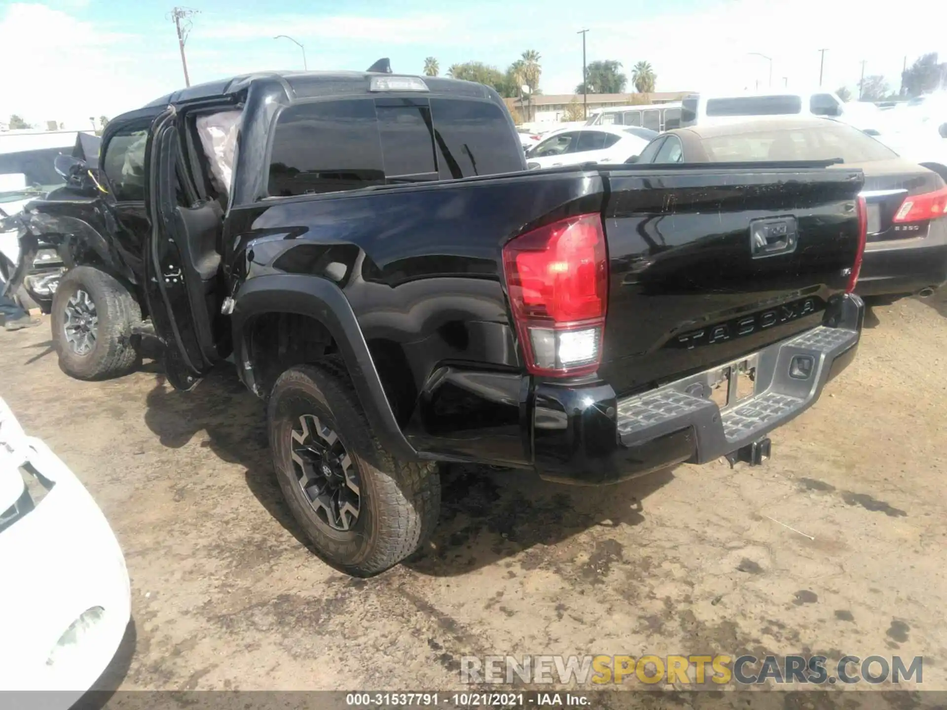 3 Photograph of a damaged car 5TFCZ5AN5KX207777 TOYOTA TACOMA 4WD 2019