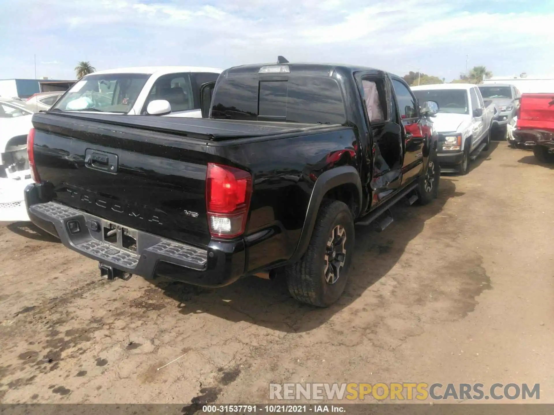 4 Photograph of a damaged car 5TFCZ5AN5KX207777 TOYOTA TACOMA 4WD 2019