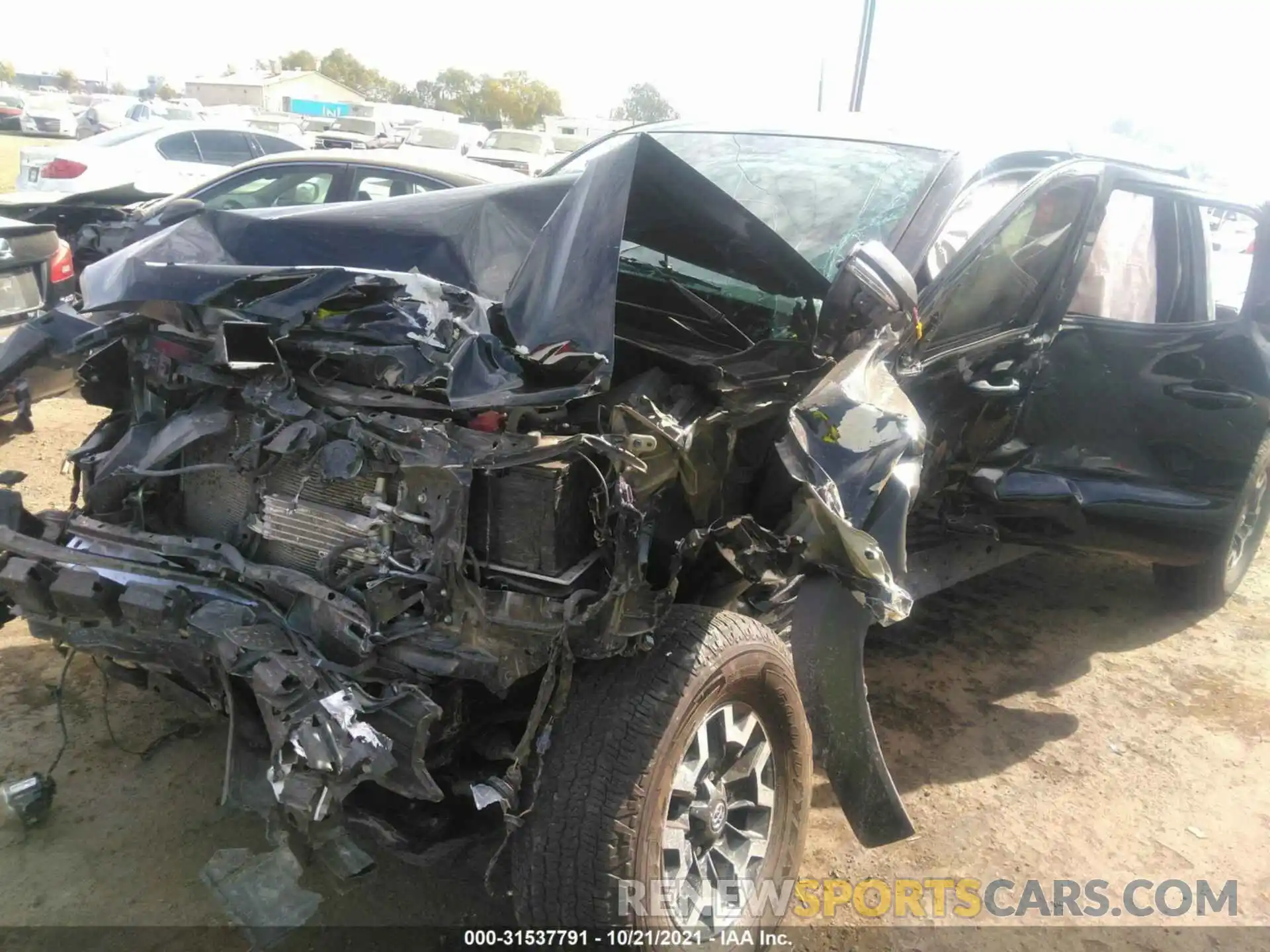 6 Photograph of a damaged car 5TFCZ5AN5KX207777 TOYOTA TACOMA 4WD 2019