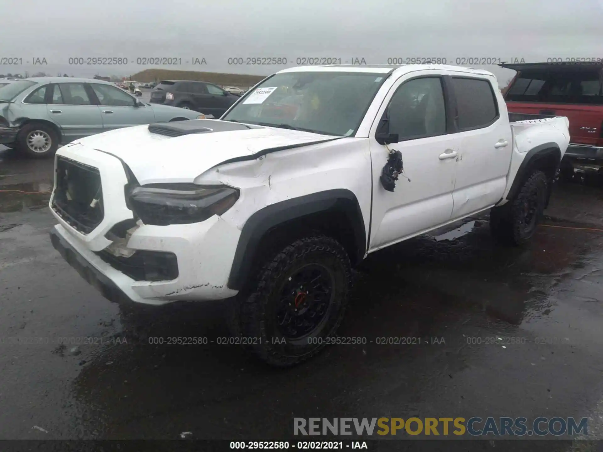 2 Photograph of a damaged car 5TFCZ5AN5KX209691 TOYOTA TACOMA 4WD 2019