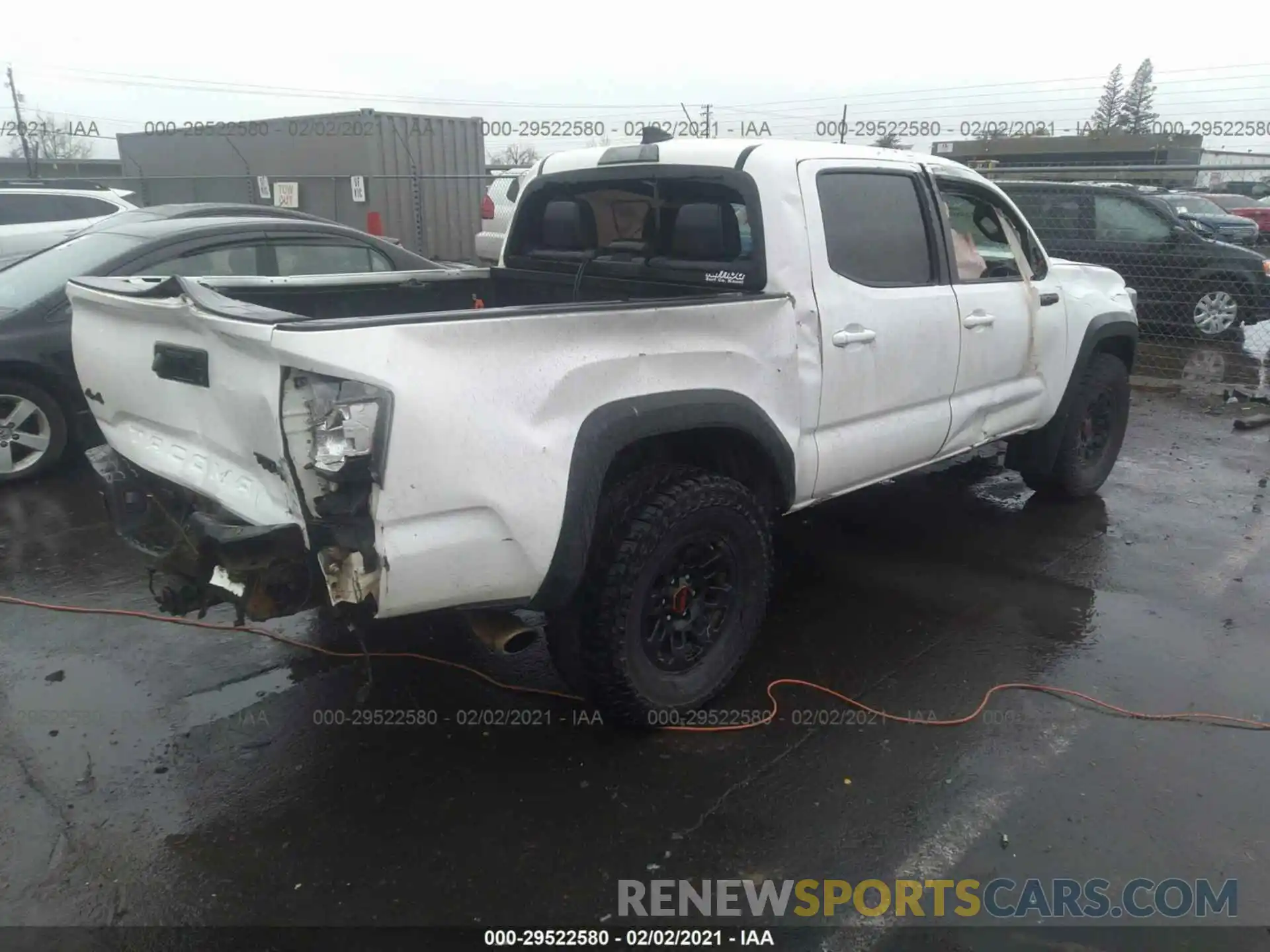 4 Photograph of a damaged car 5TFCZ5AN5KX209691 TOYOTA TACOMA 4WD 2019