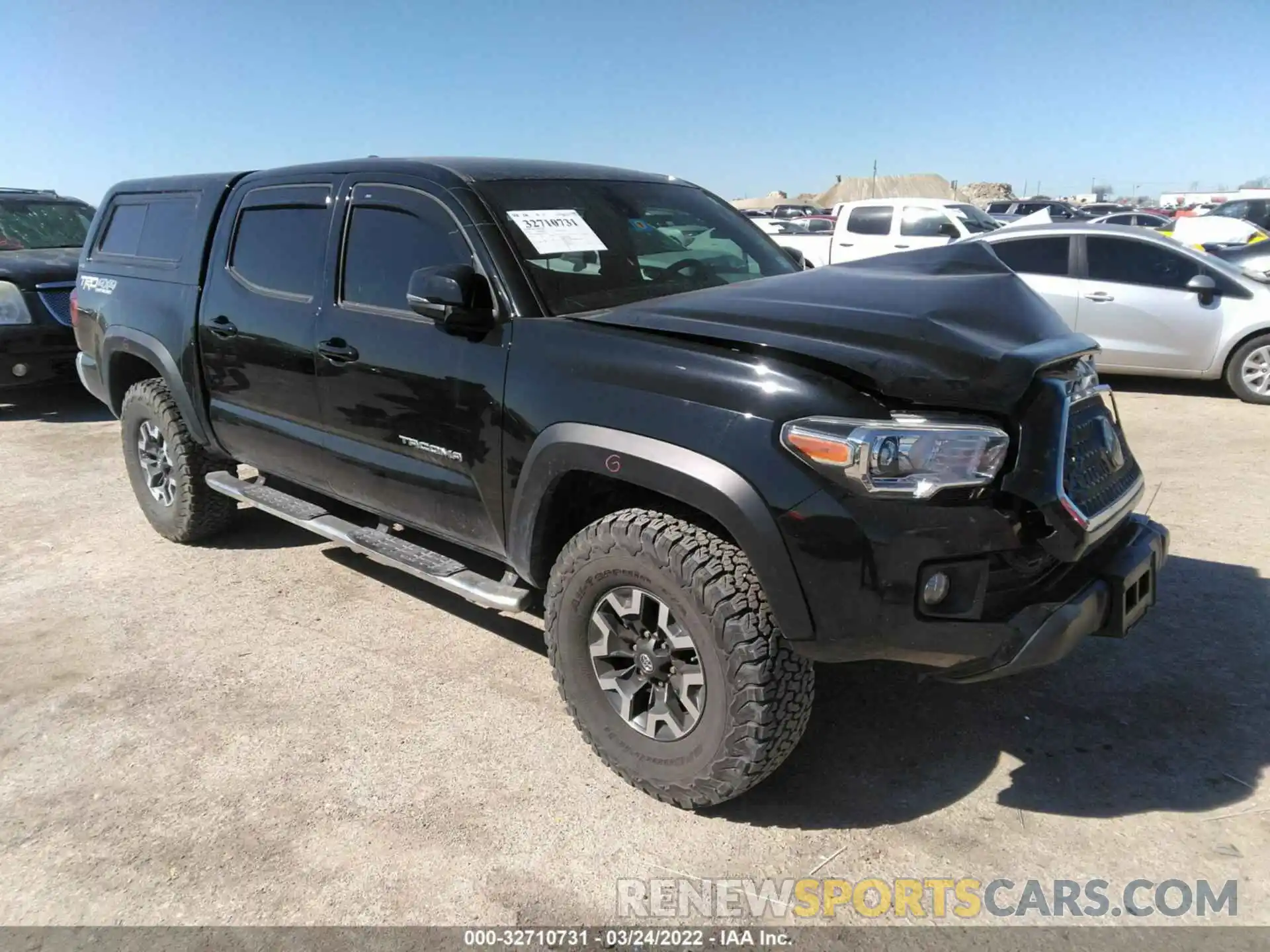 1 Photograph of a damaged car 5TFCZ5AN6KX165927 TOYOTA TACOMA 4WD 2019