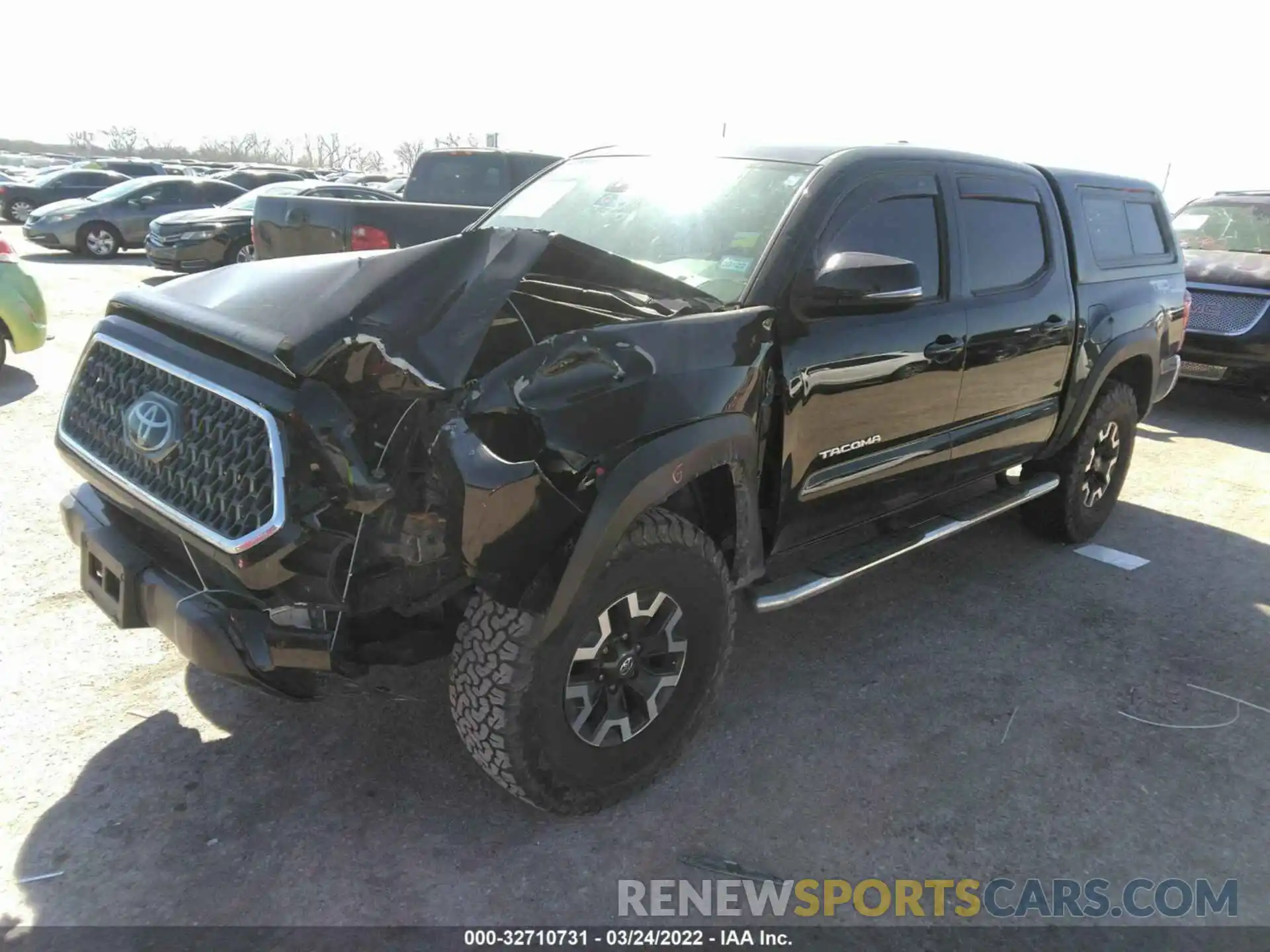 2 Photograph of a damaged car 5TFCZ5AN6KX165927 TOYOTA TACOMA 4WD 2019