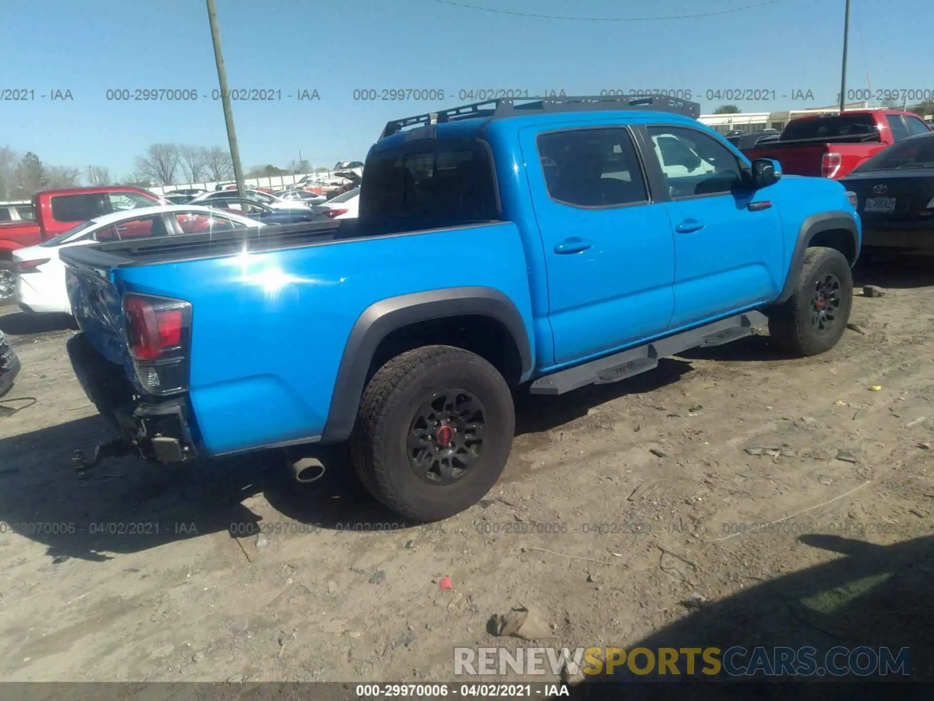 4 Фотография поврежденного автомобиля 5TFCZ5AN6KX167080 TOYOTA TACOMA 4WD 2019