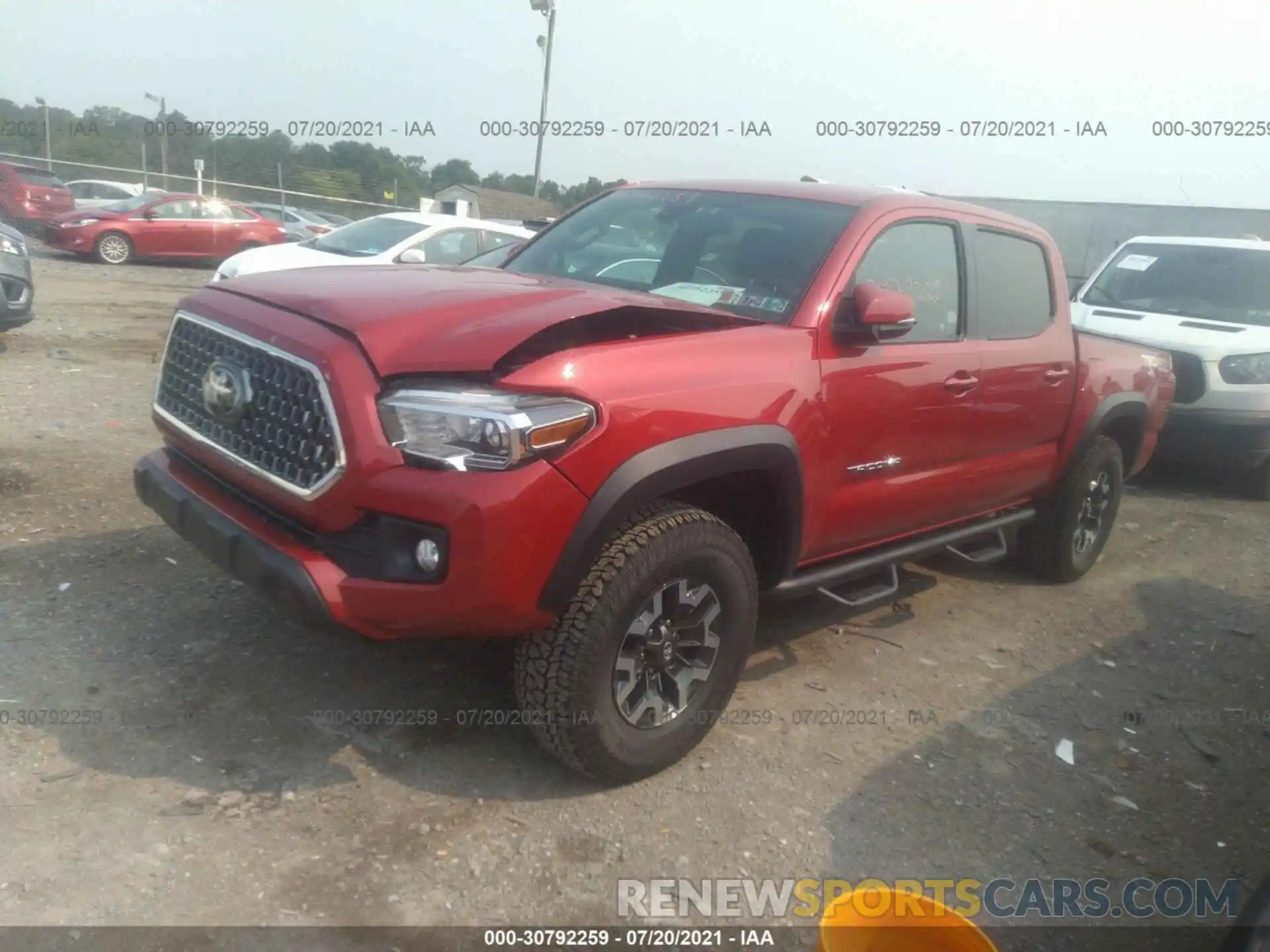 2 Photograph of a damaged car 5TFCZ5AN6KX182646 TOYOTA TACOMA 4WD 2019