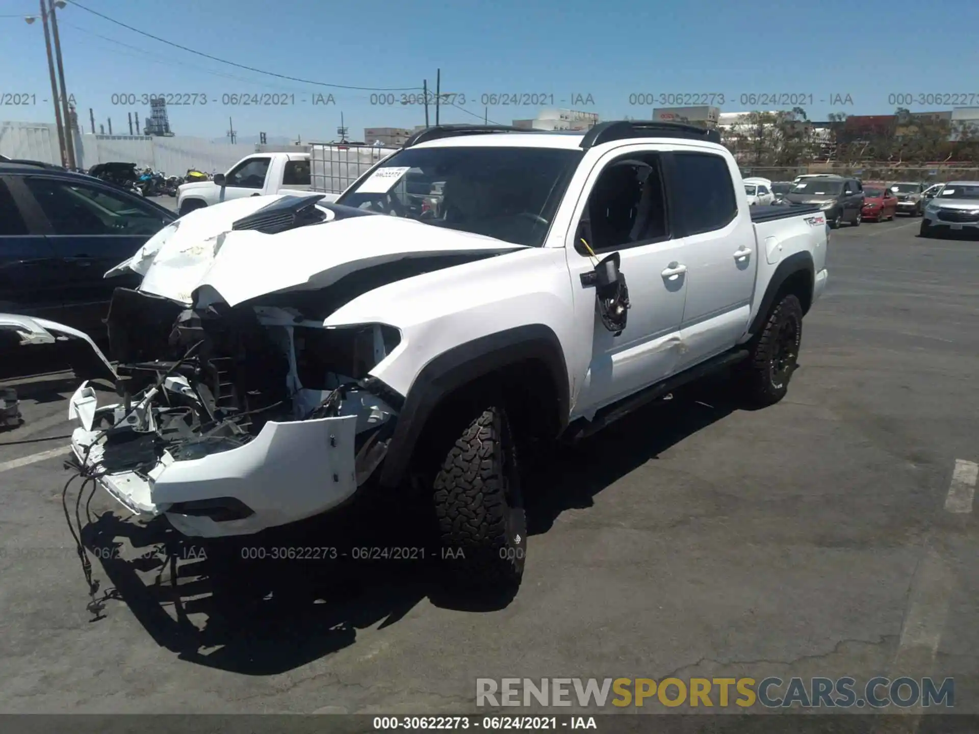 2 Фотография поврежденного автомобиля 5TFCZ5AN6KX186860 TOYOTA TACOMA 4WD 2019