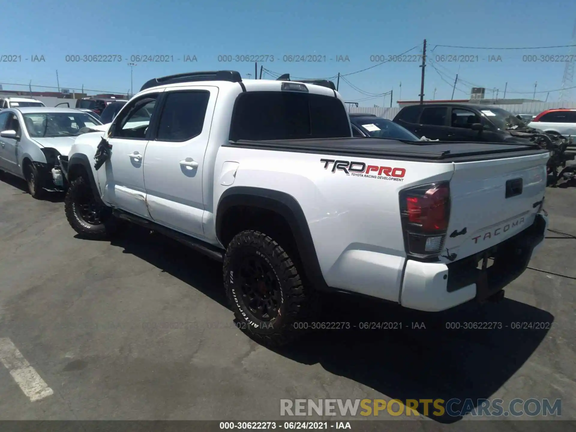 3 Photograph of a damaged car 5TFCZ5AN6KX186860 TOYOTA TACOMA 4WD 2019