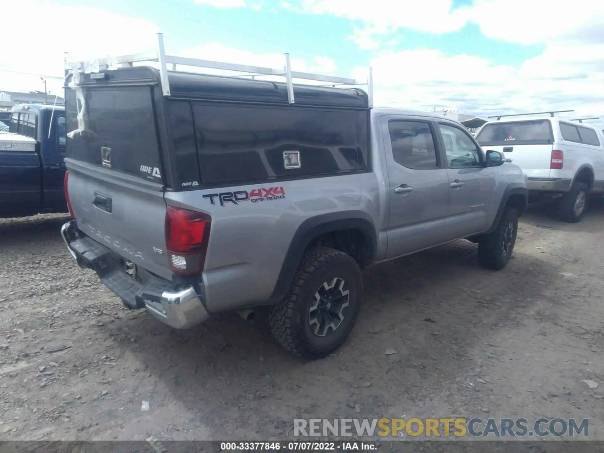 4 Photograph of a damaged car 5TFCZ5AN6KX188303 TOYOTA TACOMA 4WD 2019