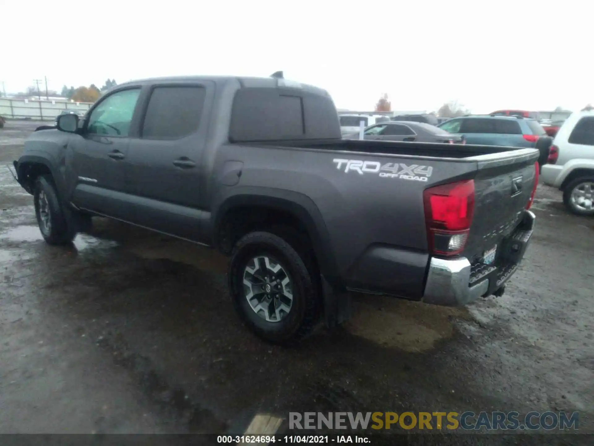 3 Photograph of a damaged car 5TFCZ5AN6KX210283 TOYOTA TACOMA 4WD 2019