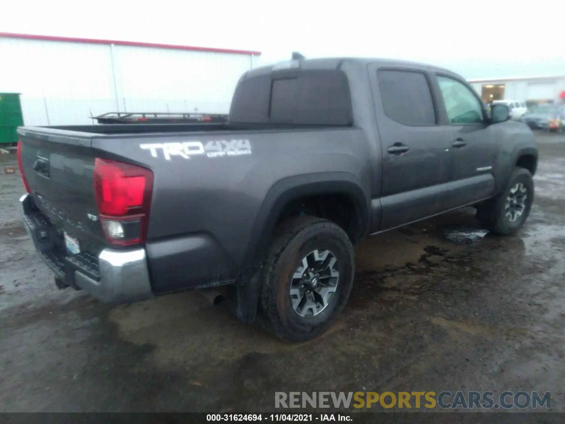 4 Photograph of a damaged car 5TFCZ5AN6KX210283 TOYOTA TACOMA 4WD 2019