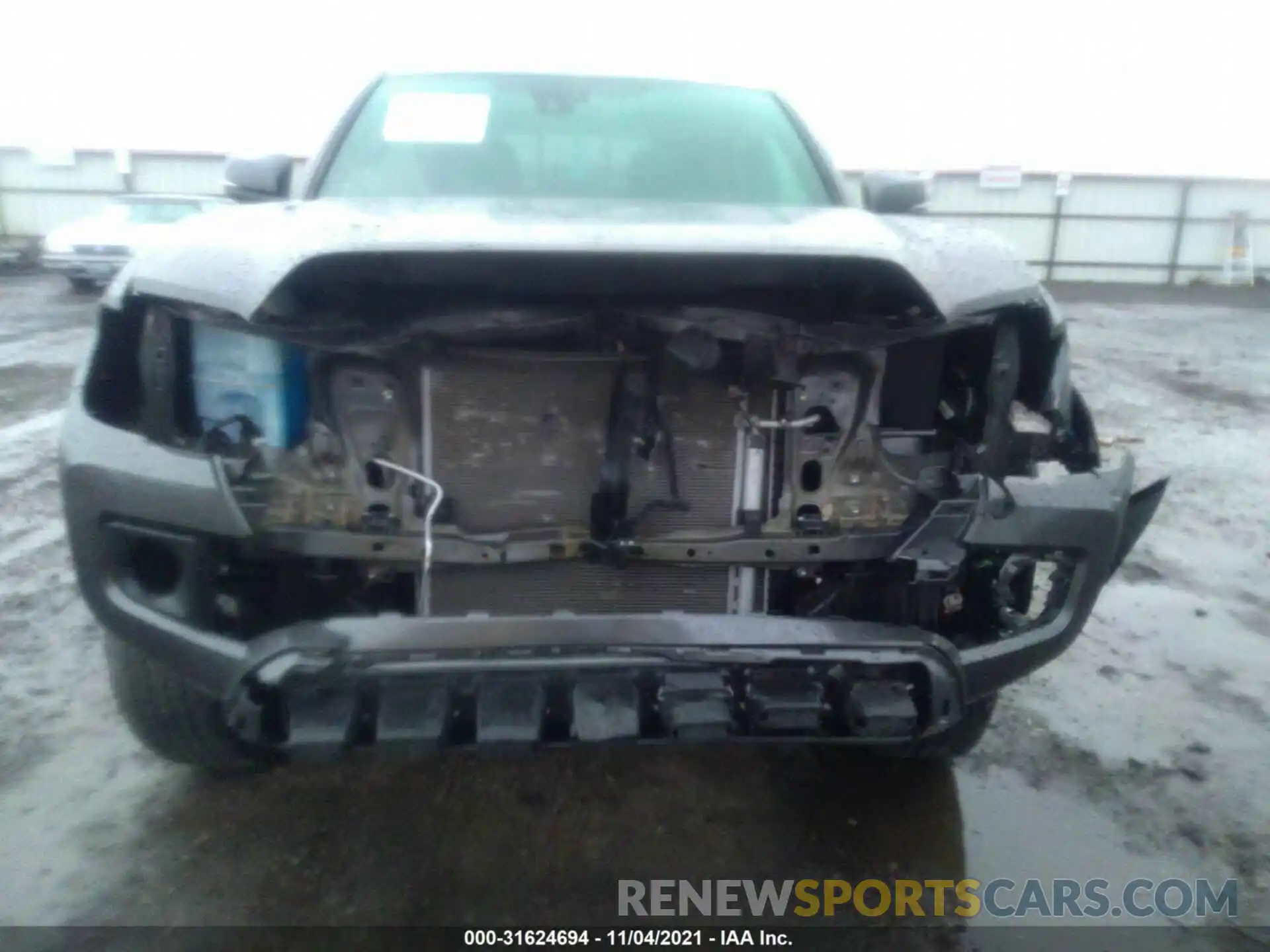 6 Photograph of a damaged car 5TFCZ5AN6KX210283 TOYOTA TACOMA 4WD 2019