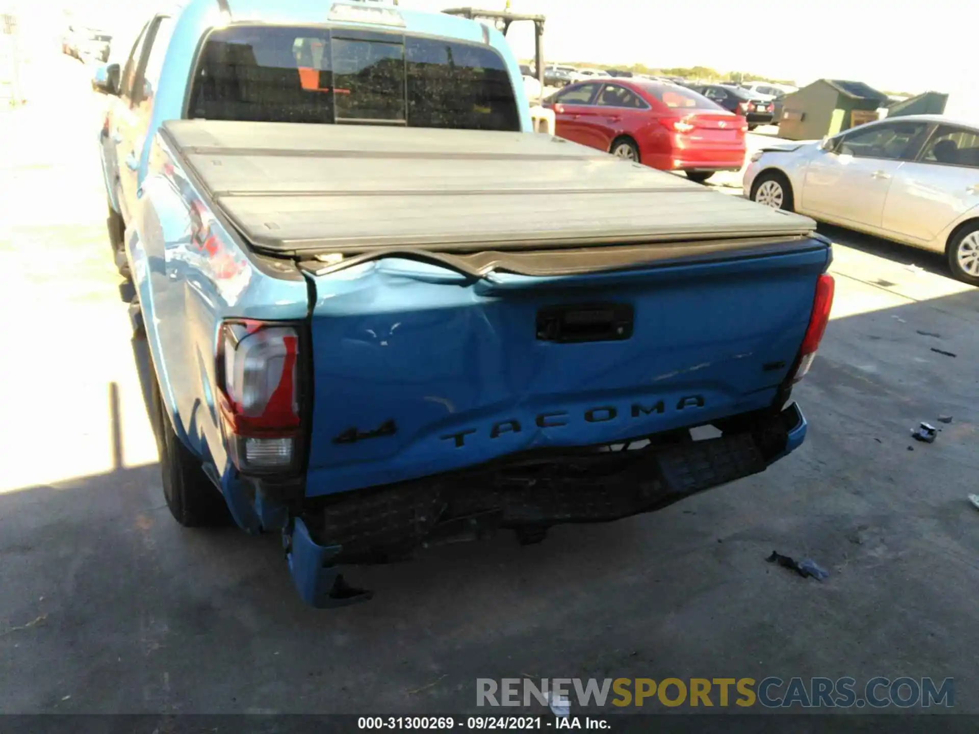 6 Photograph of a damaged car 5TFCZ5AN6KX212051 TOYOTA TACOMA 4WD 2019