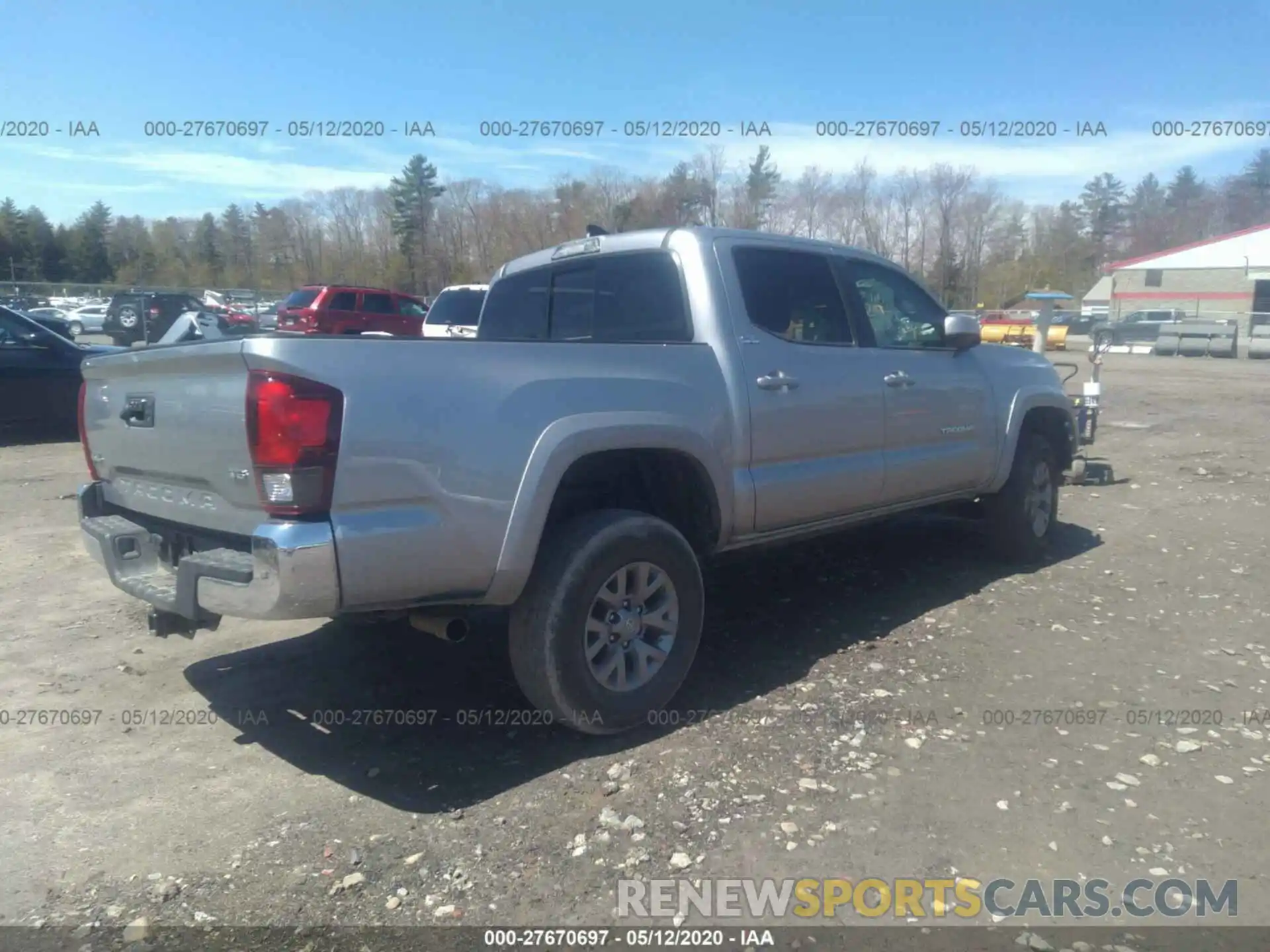 4 Photograph of a damaged car 5TFCZ5AN7KX181571 TOYOTA TACOMA 4WD 2019