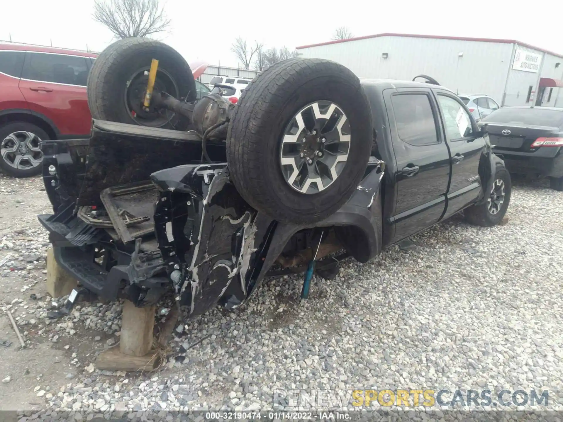 4 Photograph of a damaged car 5TFCZ5AN7KX201804 TOYOTA TACOMA 4WD 2019