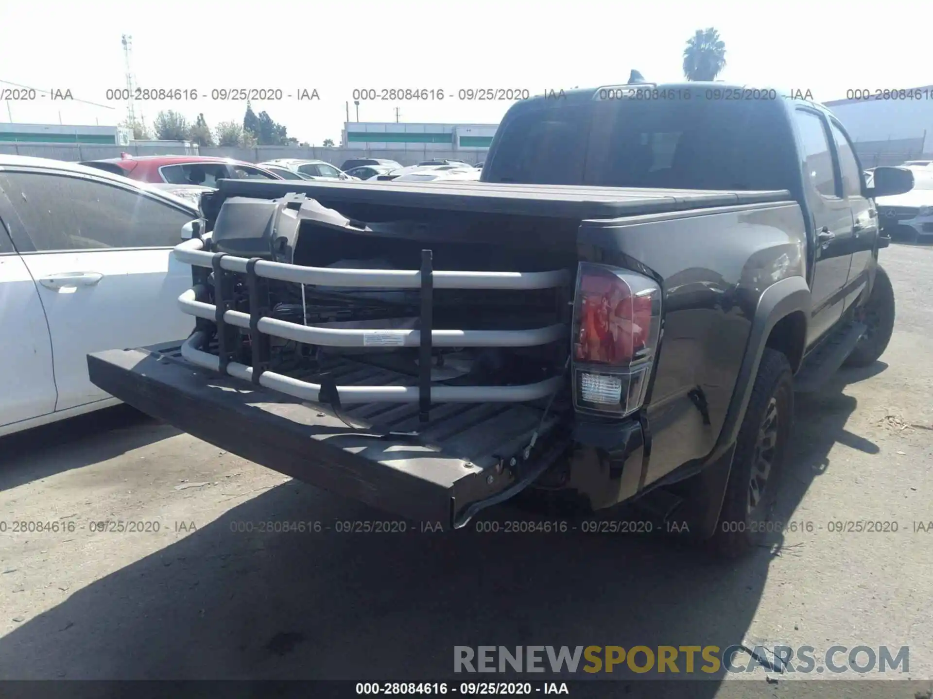 4 Photograph of a damaged car 5TFCZ5AN7KX205822 TOYOTA TACOMA 4WD 2019