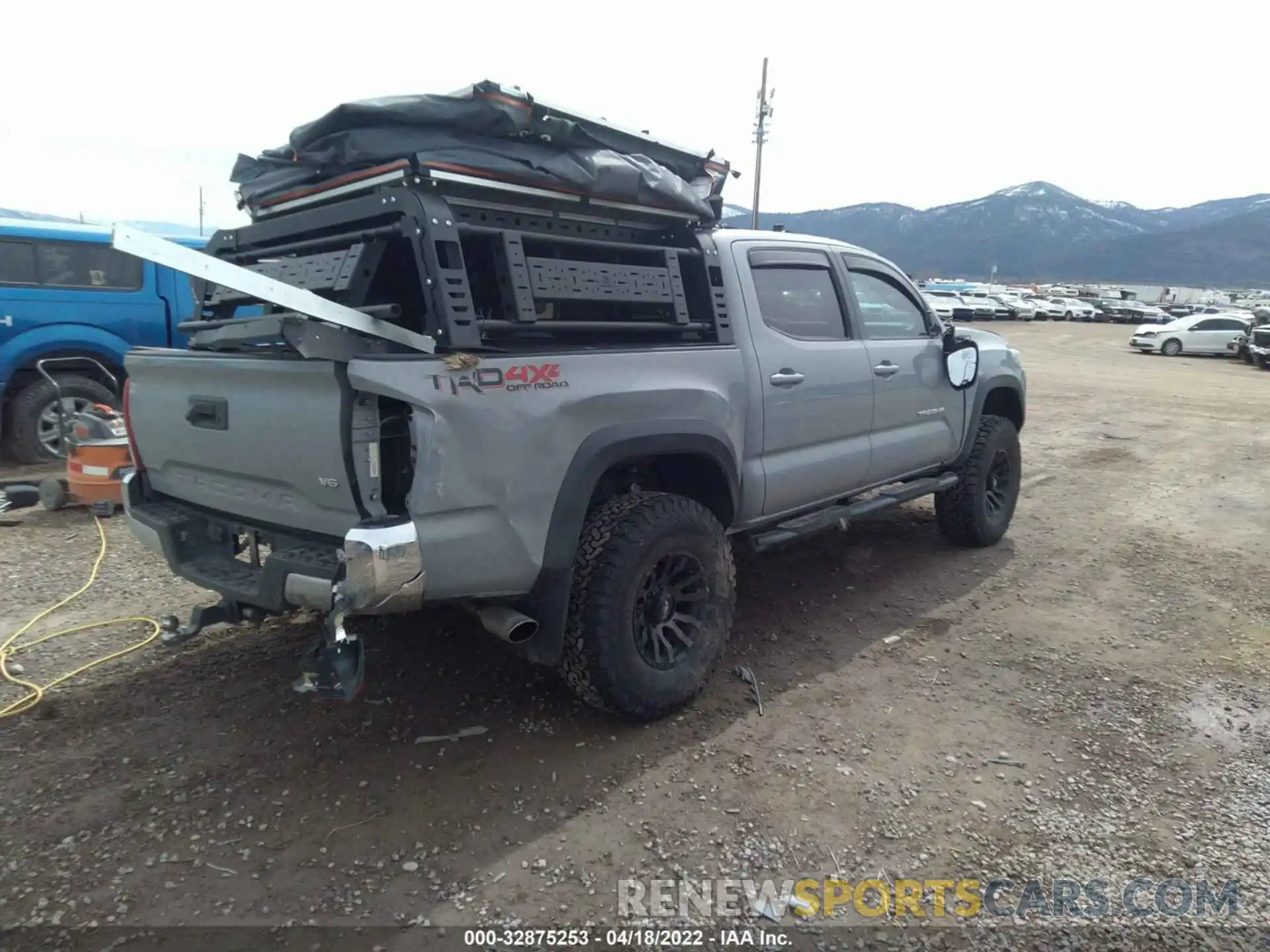 4 Photograph of a damaged car 5TFCZ5AN8KX171454 TOYOTA TACOMA 4WD 2019