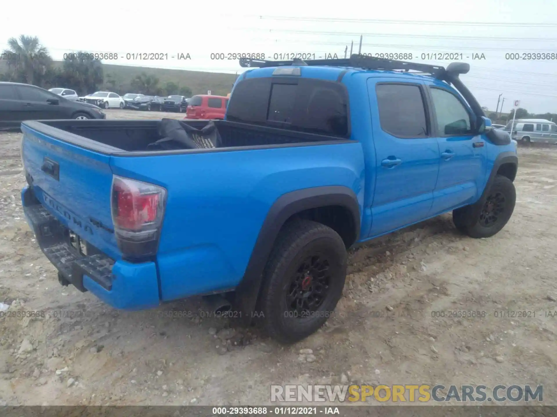 4 Photograph of a damaged car 5TFCZ5AN8KX182843 TOYOTA TACOMA 4WD 2019