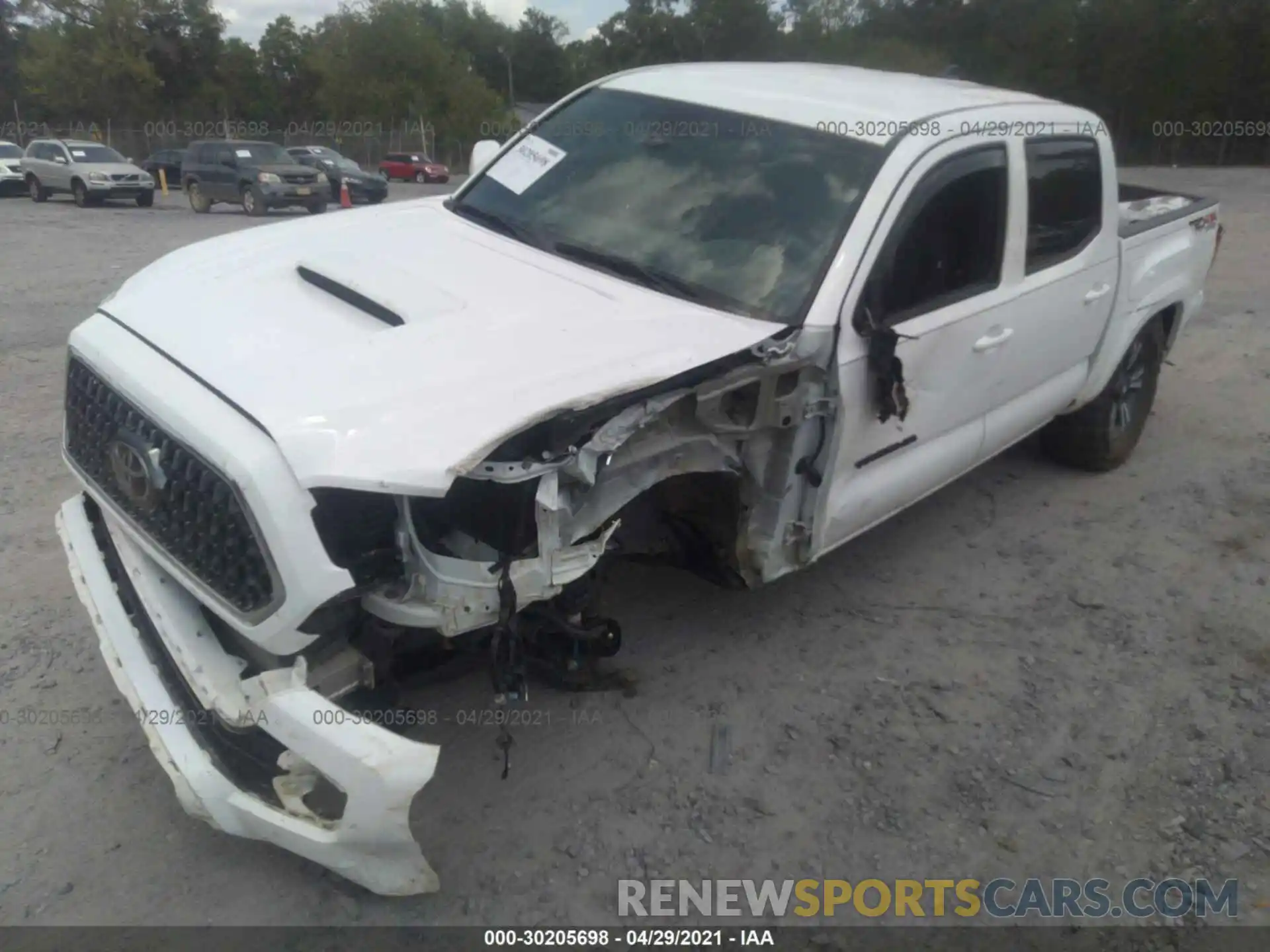 6 Photograph of a damaged car 5TFCZ5AN8KX188612 TOYOTA TACOMA 4WD 2019