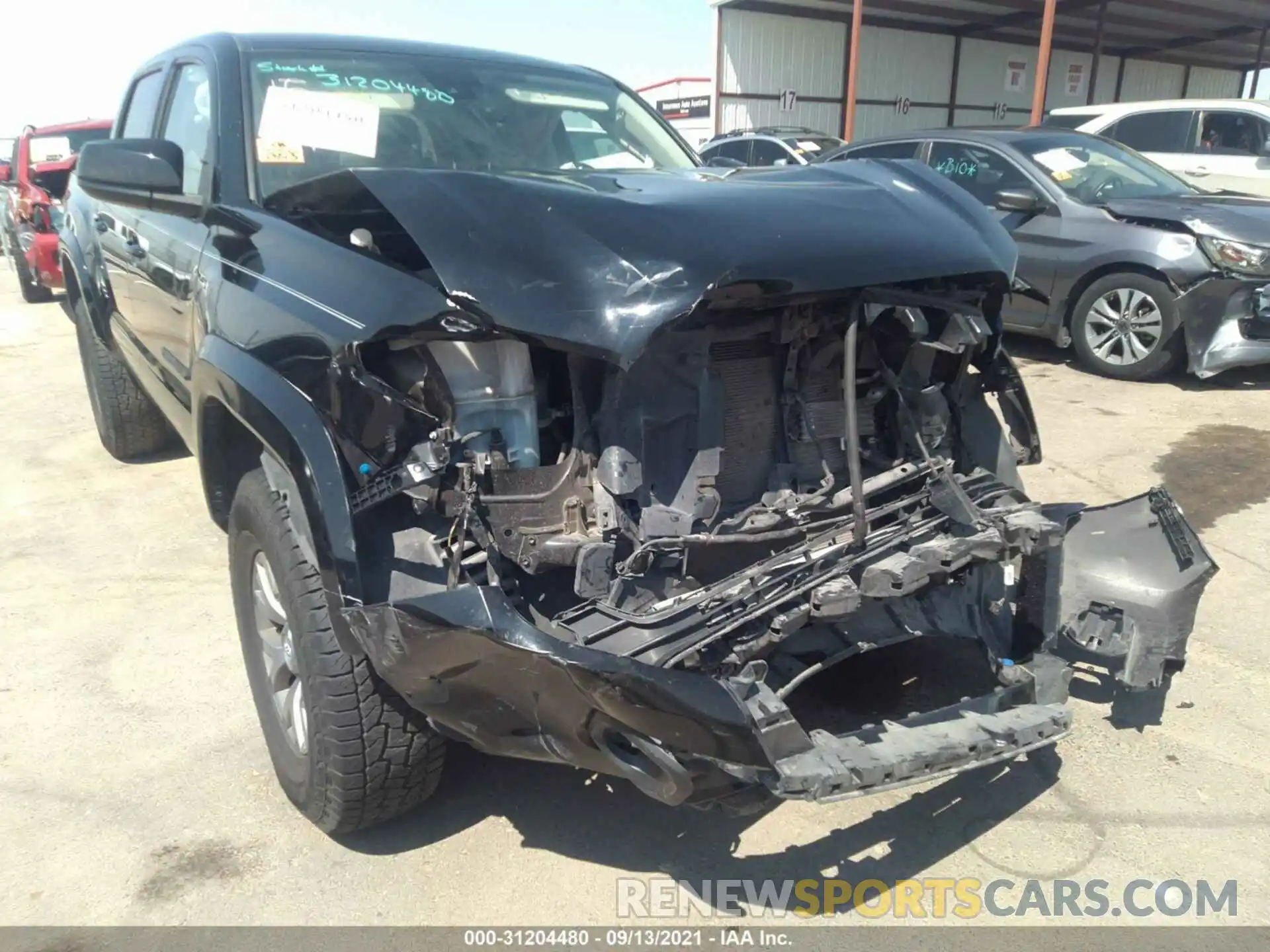 1 Photograph of a damaged car 5TFCZ5AN8KX195527 TOYOTA TACOMA 4WD 2019