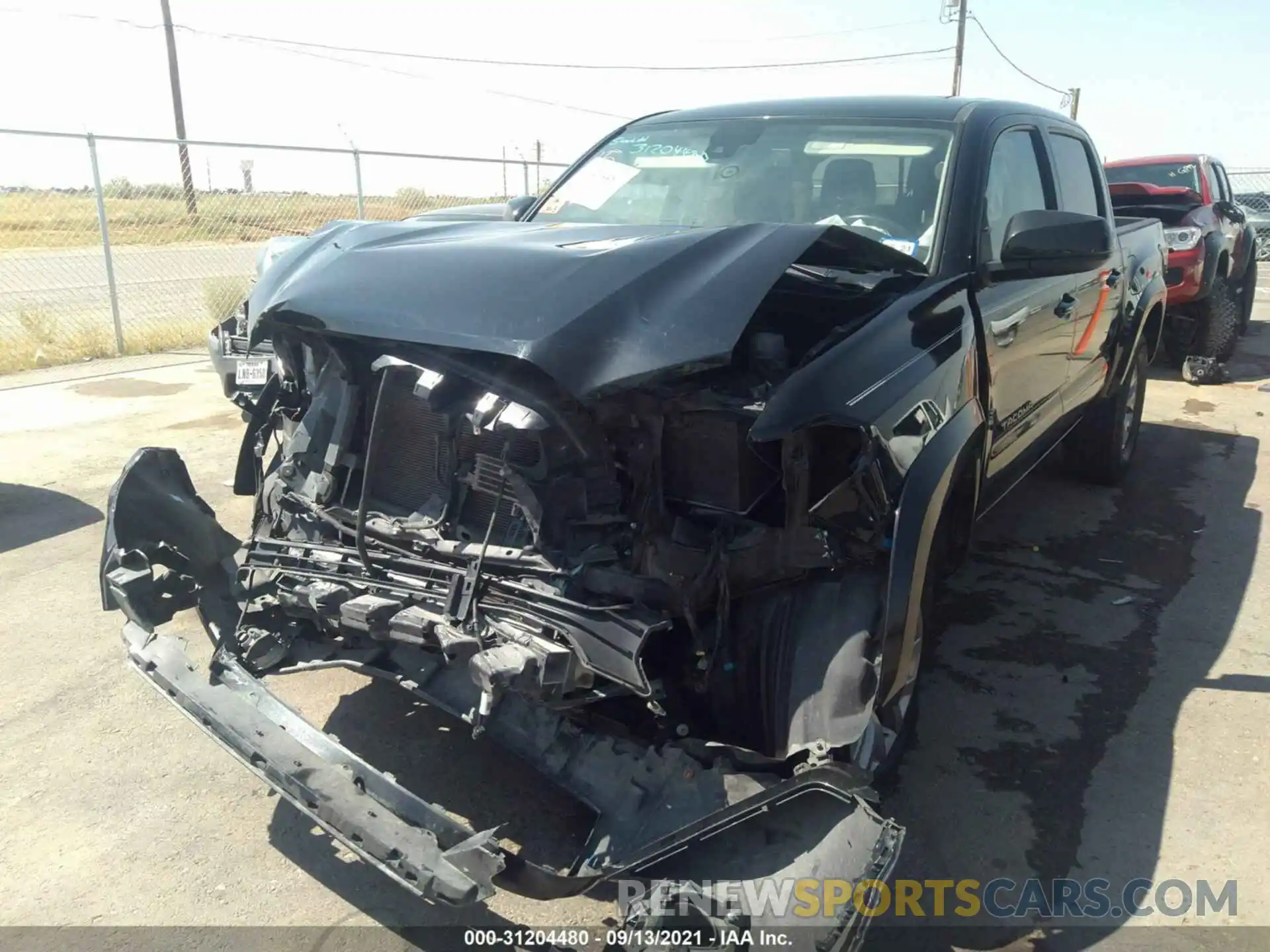 2 Photograph of a damaged car 5TFCZ5AN8KX195527 TOYOTA TACOMA 4WD 2019