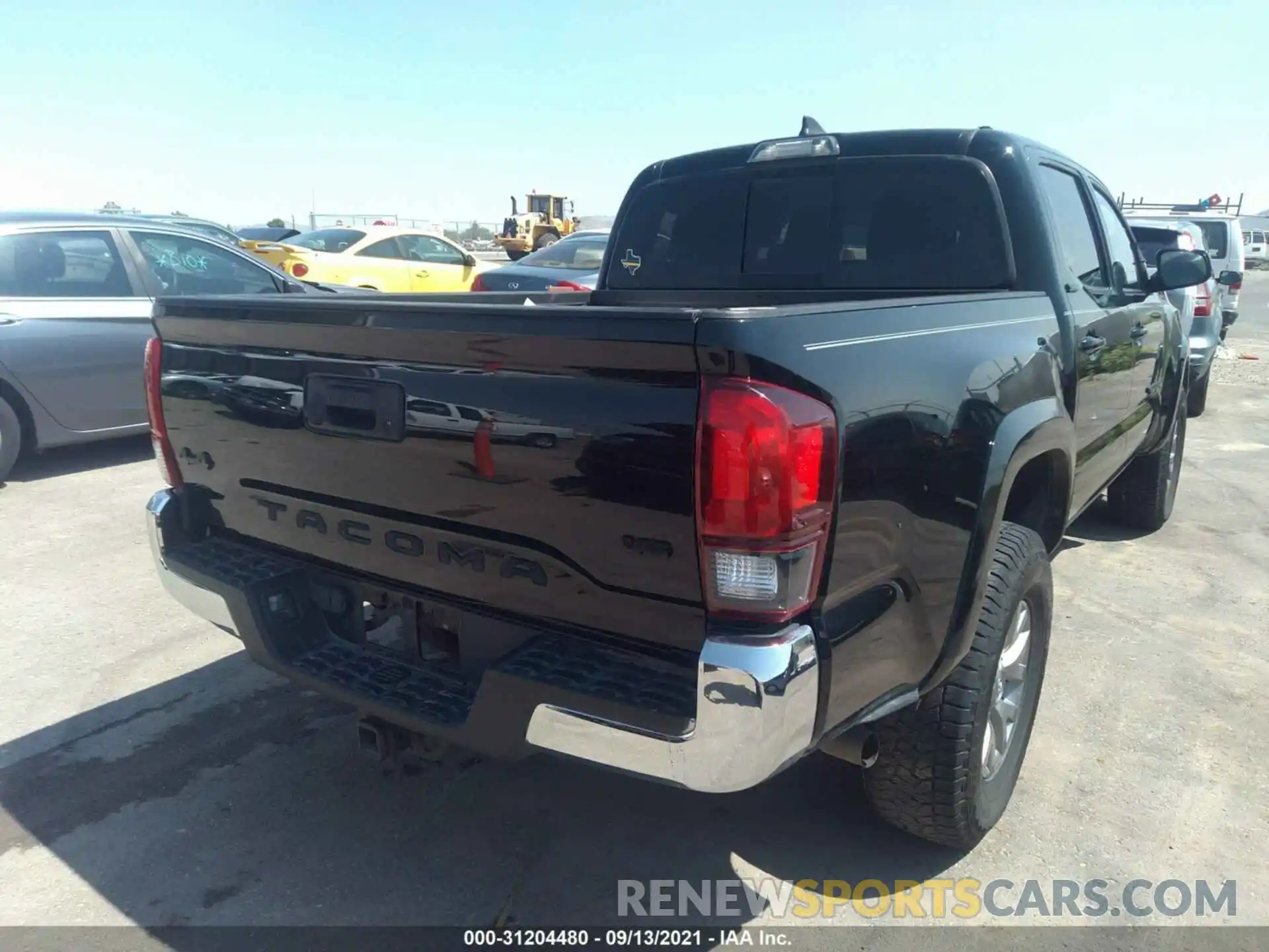 4 Photograph of a damaged car 5TFCZ5AN8KX195527 TOYOTA TACOMA 4WD 2019