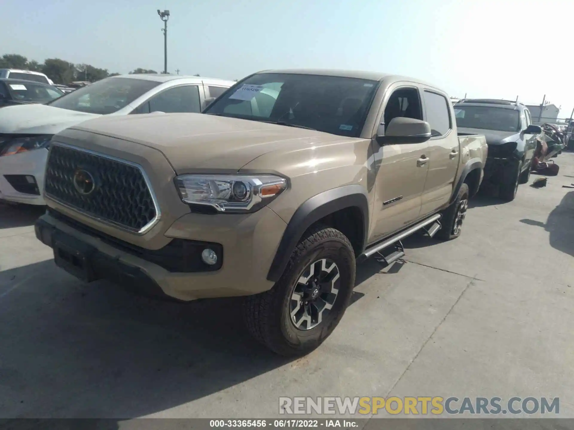 2 Photograph of a damaged car 5TFCZ5AN8KX209667 TOYOTA TACOMA 4WD 2019