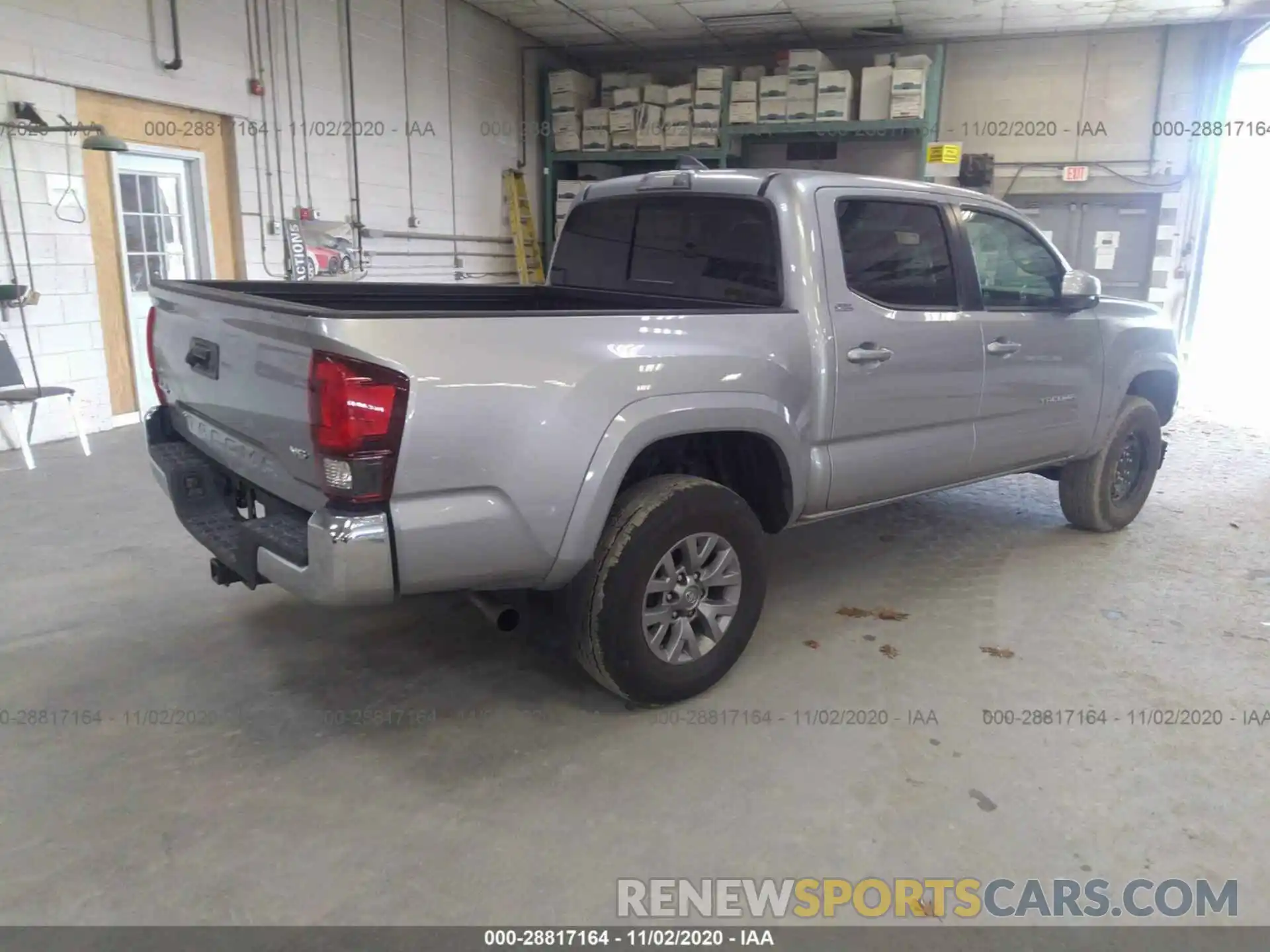 4 Photograph of a damaged car 5TFCZ5AN9KX176551 TOYOTA TACOMA 4WD 2019