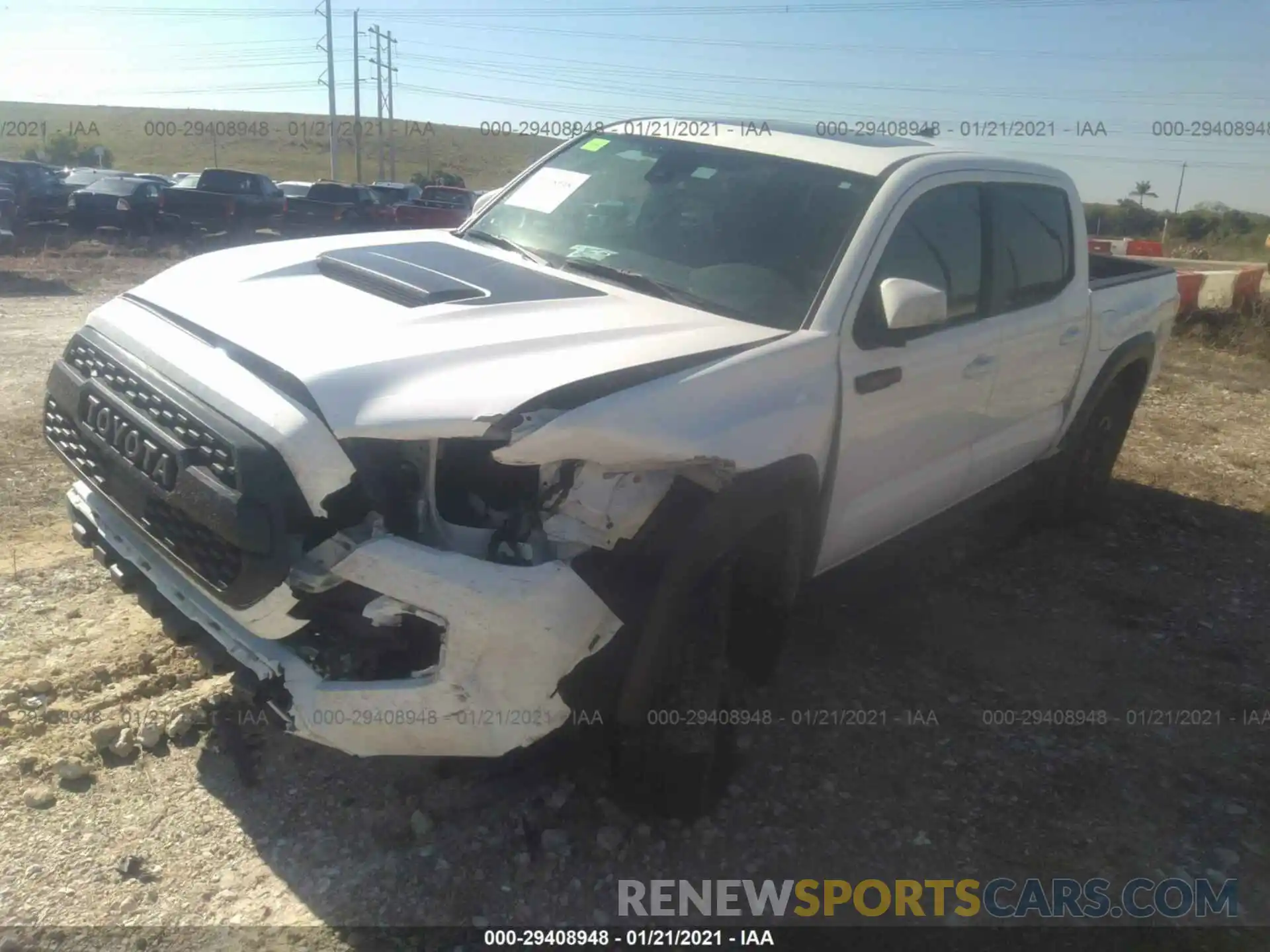 2 Photograph of a damaged car 5TFCZ5AN9KX183418 TOYOTA TACOMA 4WD 2019