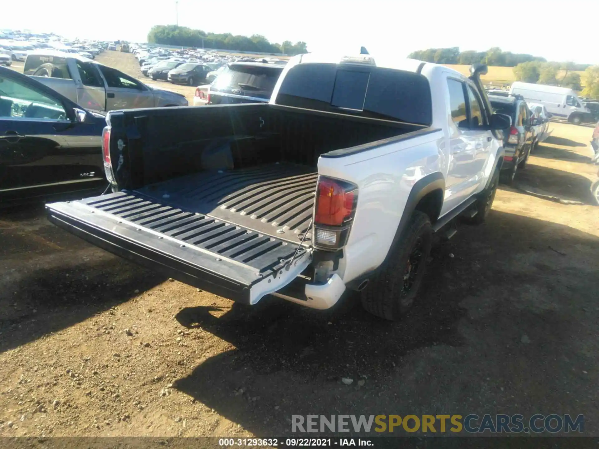 4 Photograph of a damaged car 5TFCZ5AN9KX197397 TOYOTA TACOMA 4WD 2019