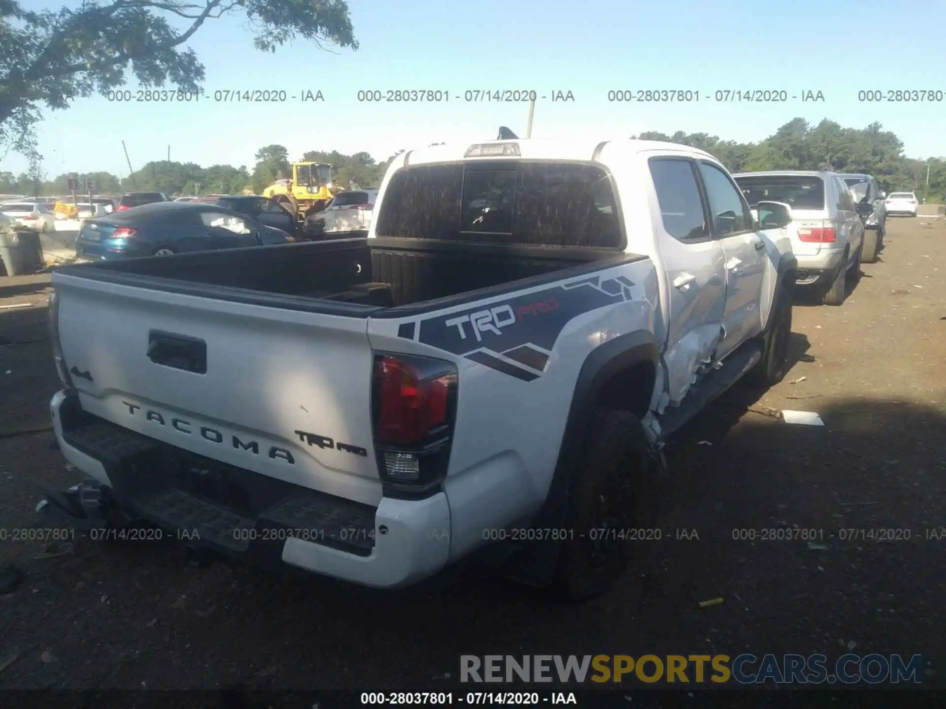 4 Photograph of a damaged car 5TFCZ5AN9KX198453 TOYOTA TACOMA 4WD 2019