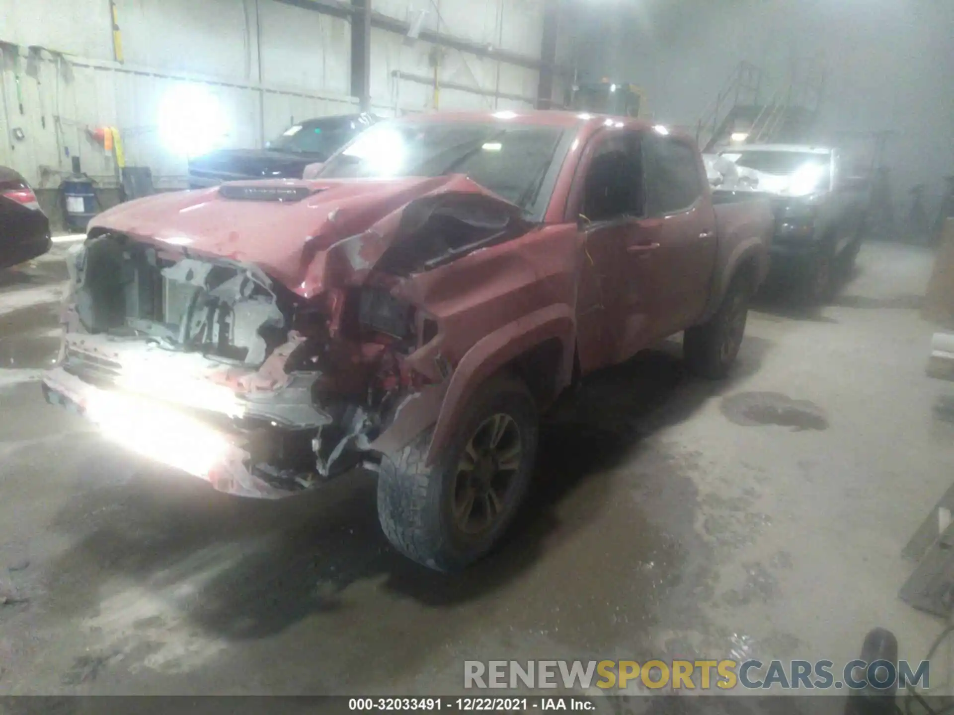 2 Photograph of a damaged car 5TFCZ5AN9KX208351 TOYOTA TACOMA 4WD 2019