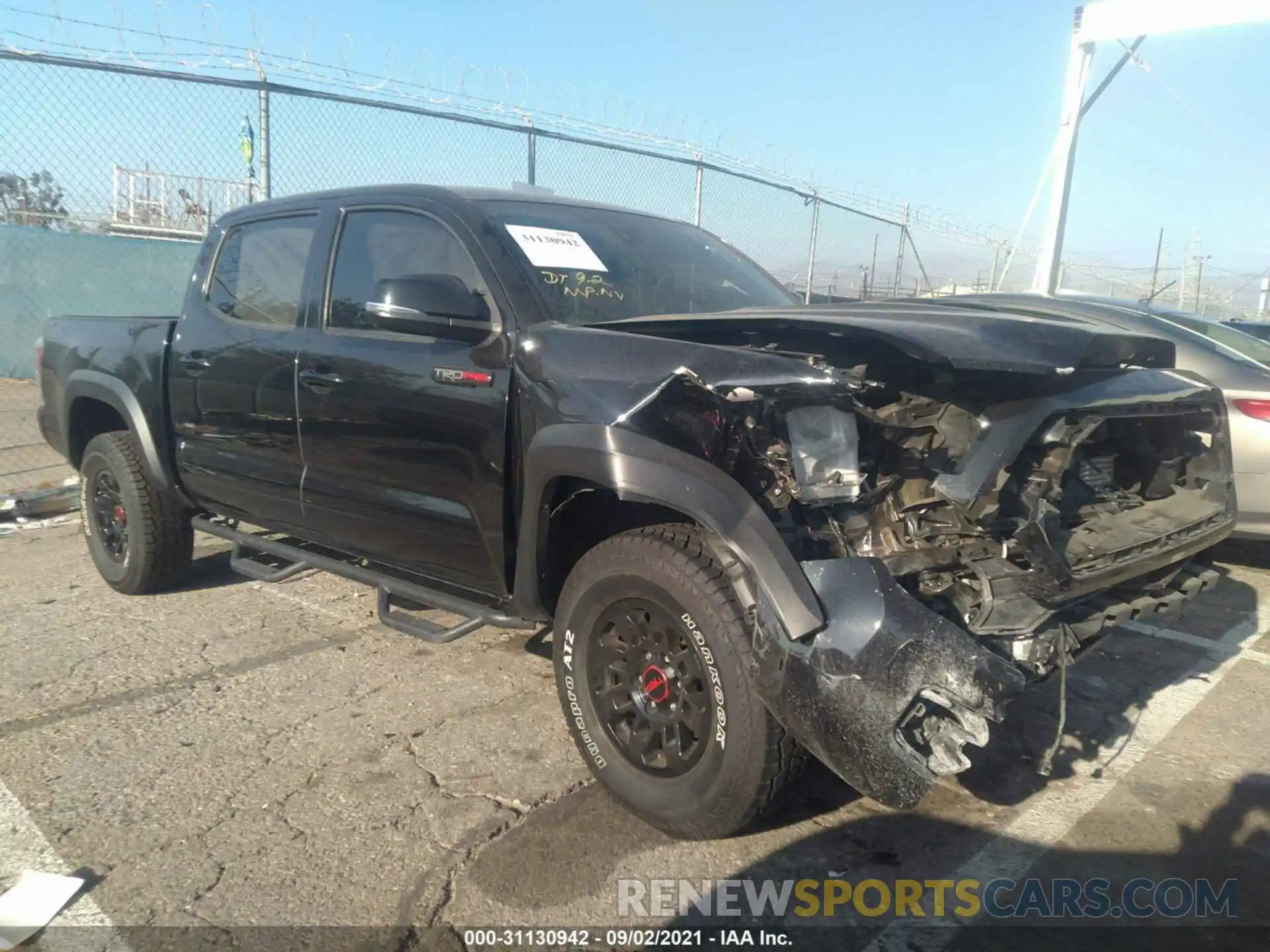 1 Photograph of a damaged car 5TFCZ5AN9KX210942 TOYOTA TACOMA 4WD 2019