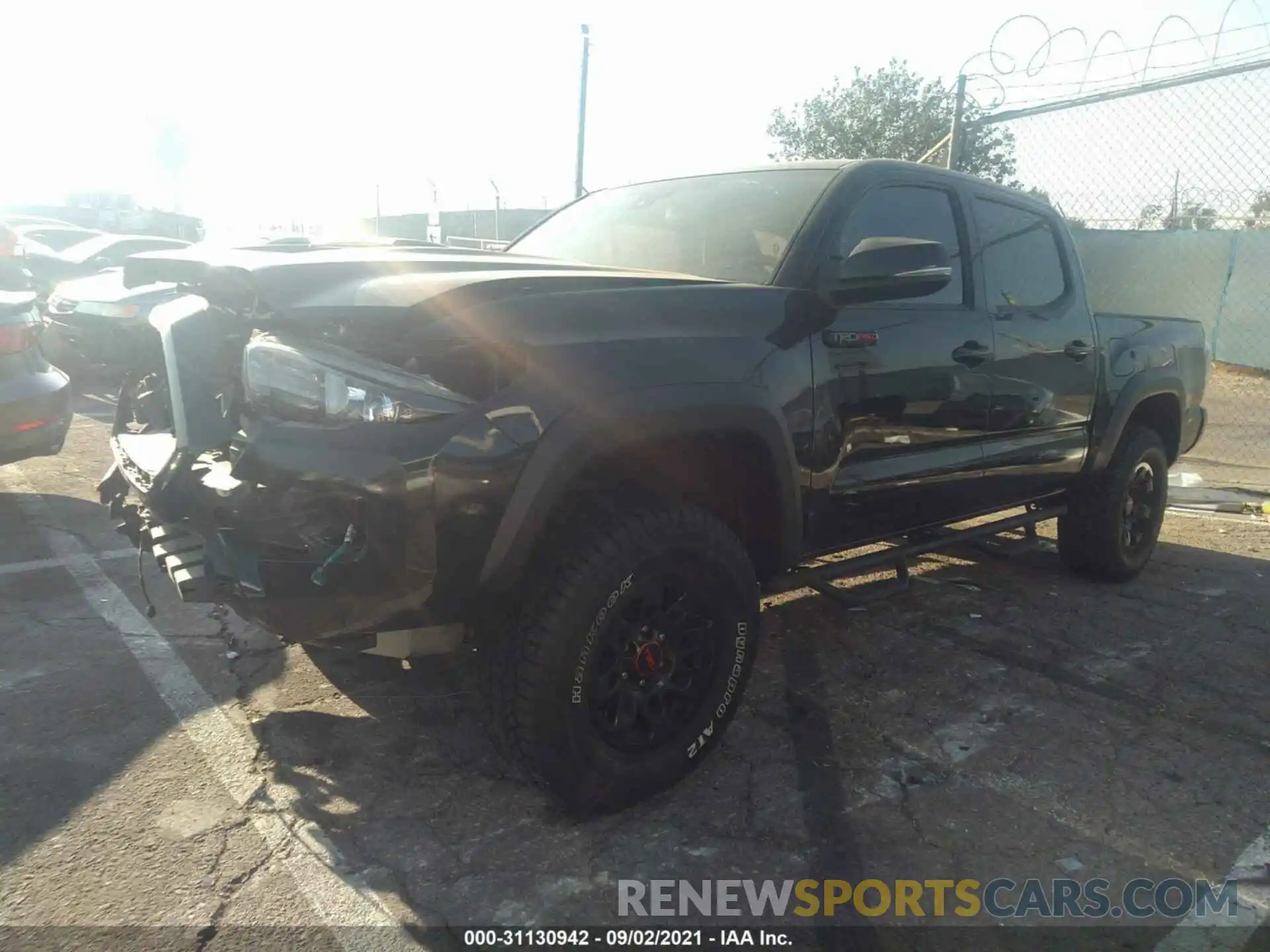 2 Photograph of a damaged car 5TFCZ5AN9KX210942 TOYOTA TACOMA 4WD 2019