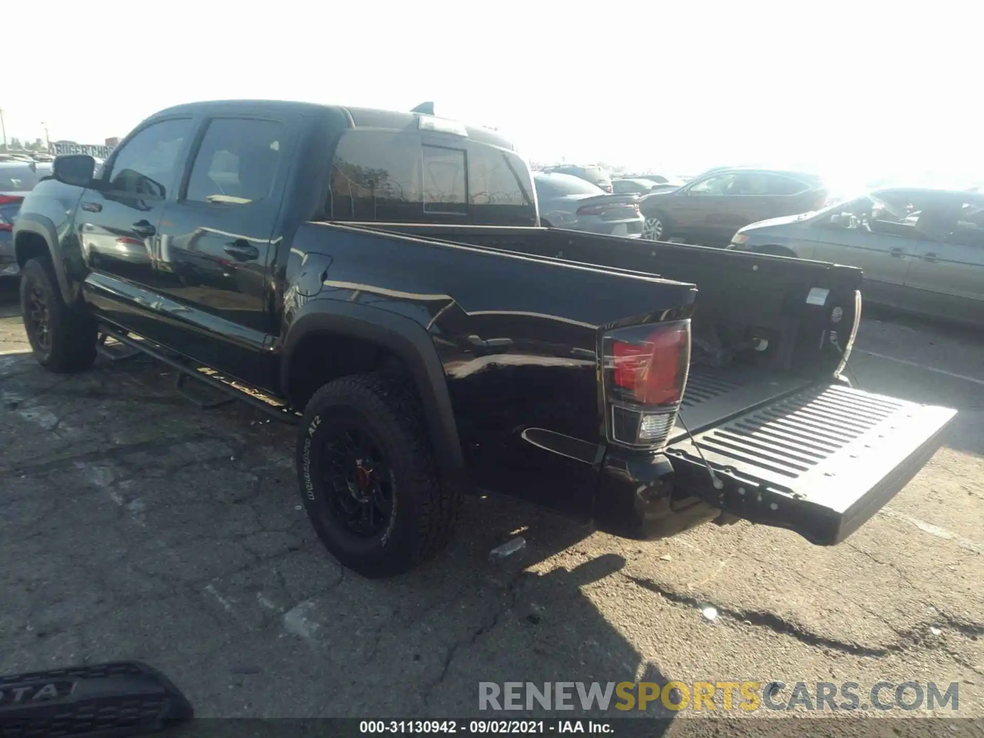 3 Photograph of a damaged car 5TFCZ5AN9KX210942 TOYOTA TACOMA 4WD 2019