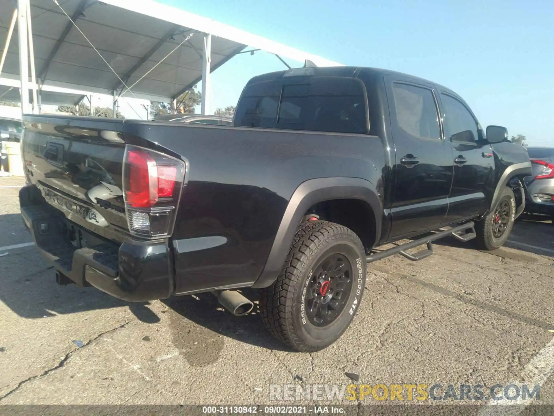 4 Фотография поврежденного автомобиля 5TFCZ5AN9KX210942 TOYOTA TACOMA 4WD 2019