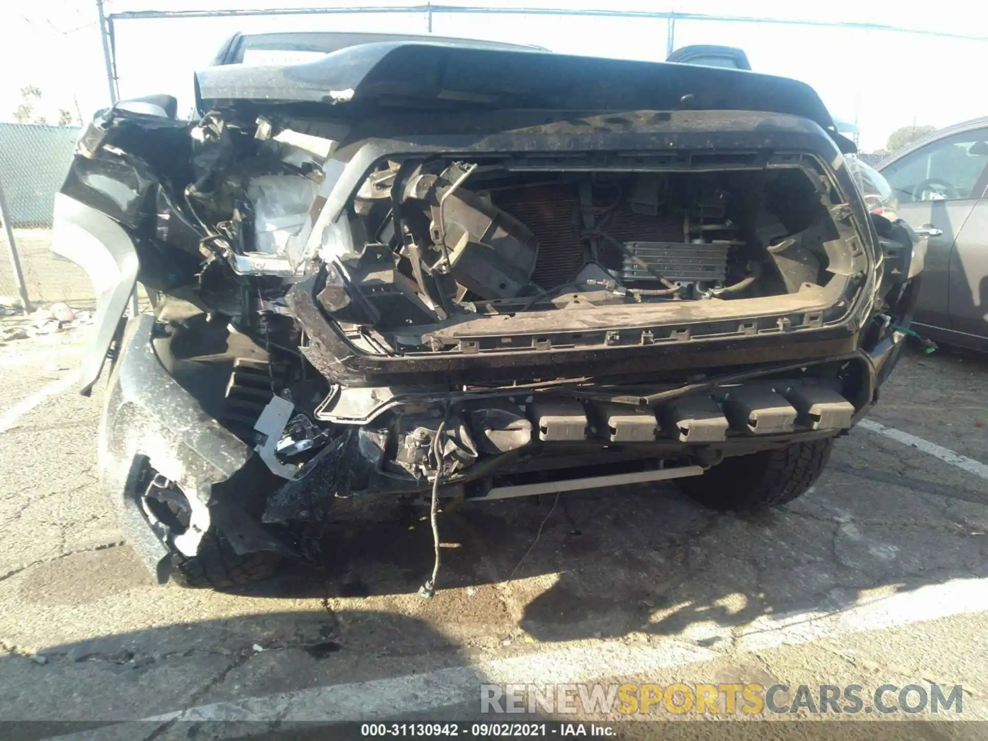 6 Photograph of a damaged car 5TFCZ5AN9KX210942 TOYOTA TACOMA 4WD 2019