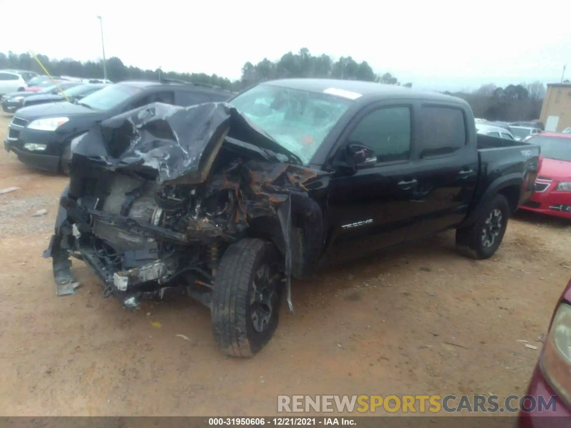 2 Photograph of a damaged car 5TFCZ5ANXKX169253 TOYOTA TACOMA 4WD 2019