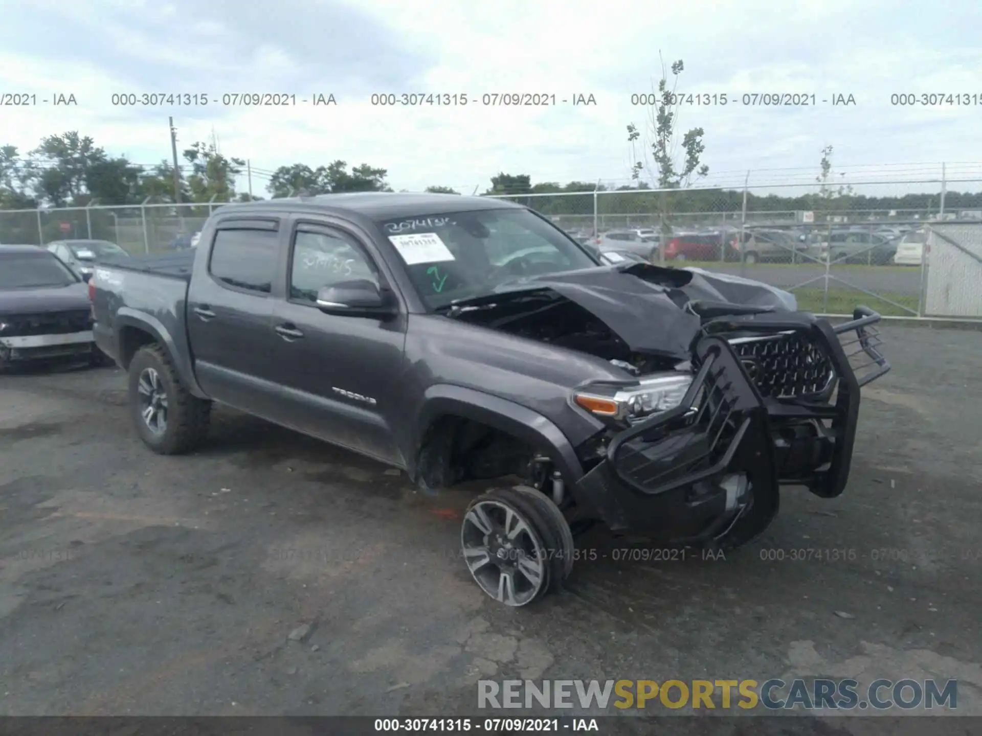 1 Photograph of a damaged car 5TFCZ5ANXKX185680 TOYOTA TACOMA 4WD 2019