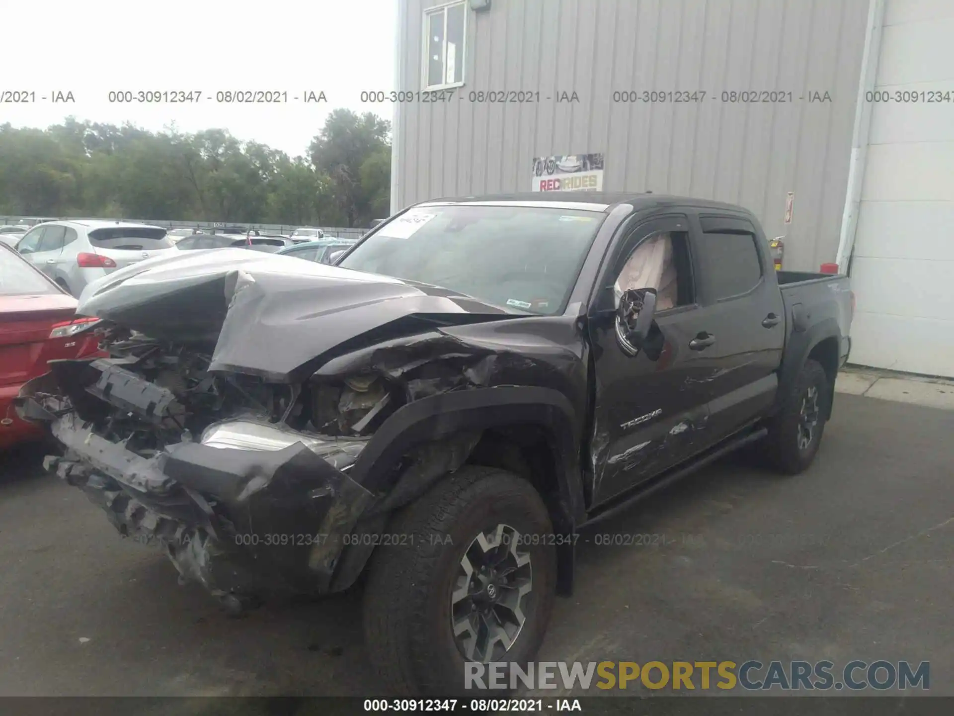 2 Photograph of a damaged car 5TFCZ5ANXKX185968 TOYOTA TACOMA 4WD 2019